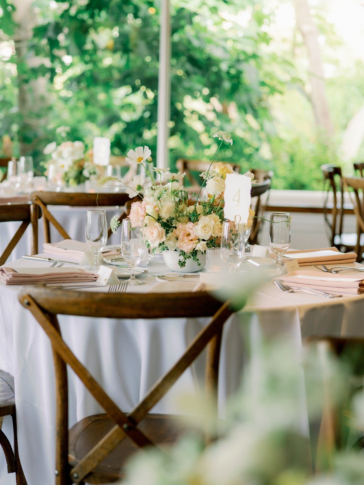 garden inspired wedding reception with pastel florals