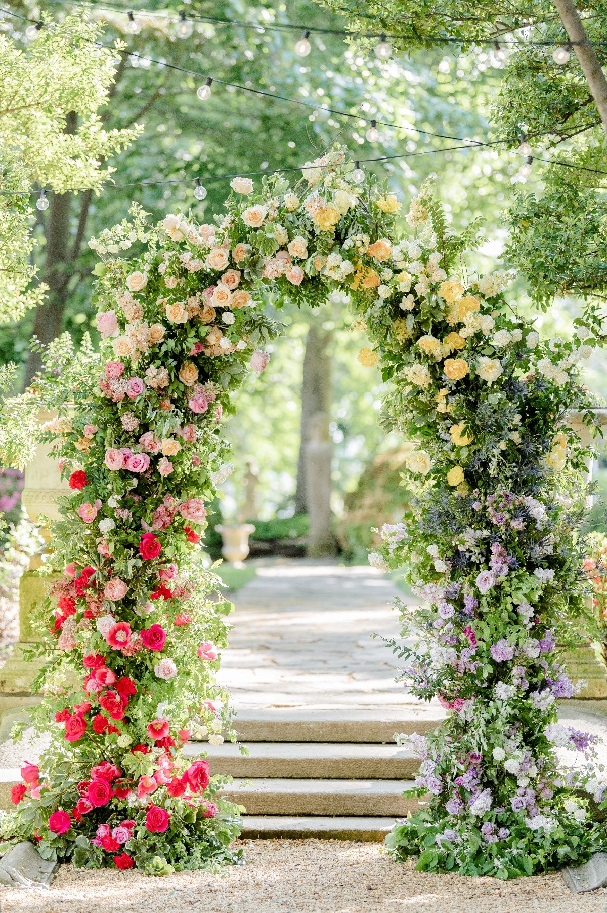 muted rainbow floral arch