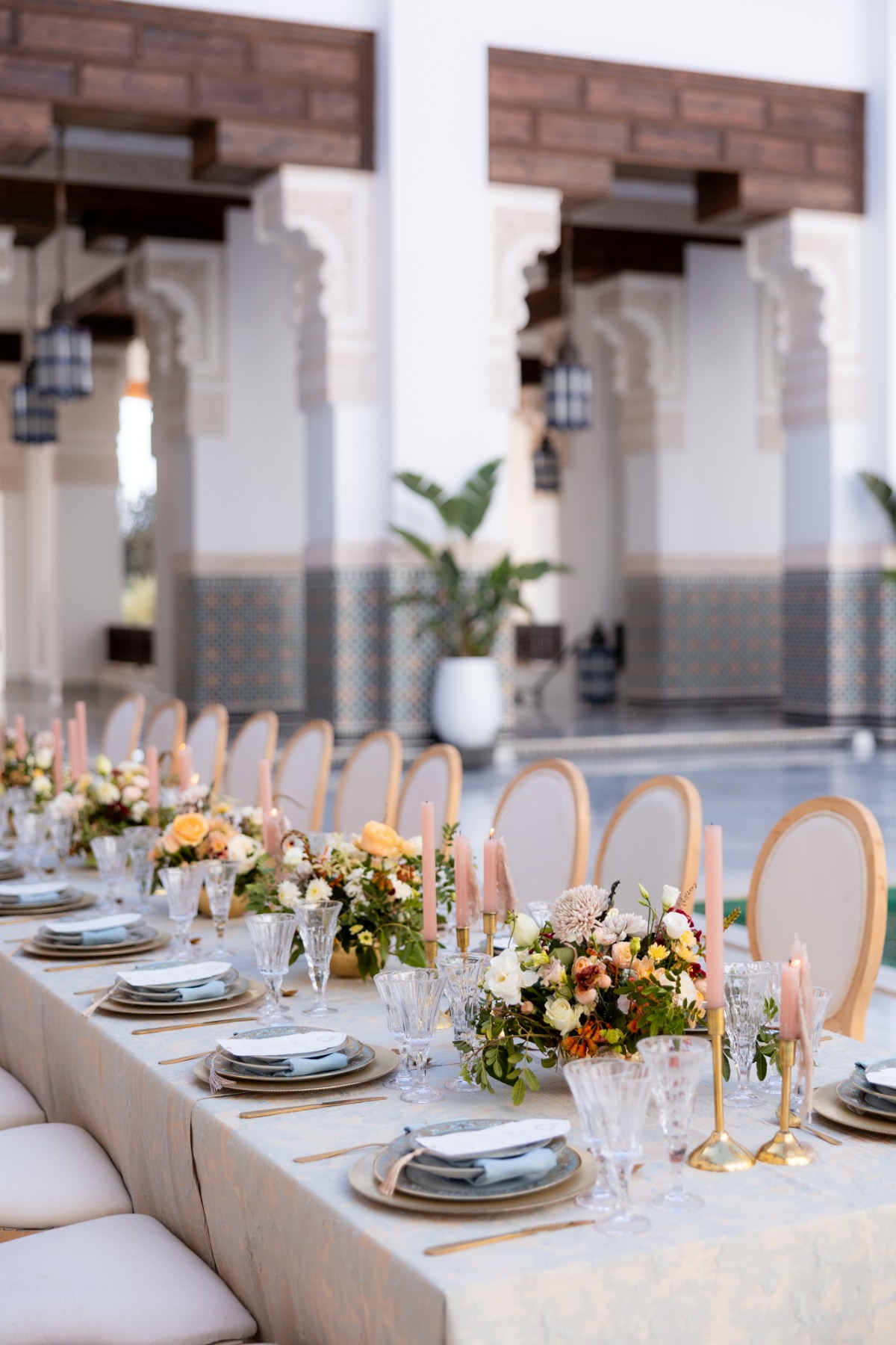 soft pink candles on gold candelabras