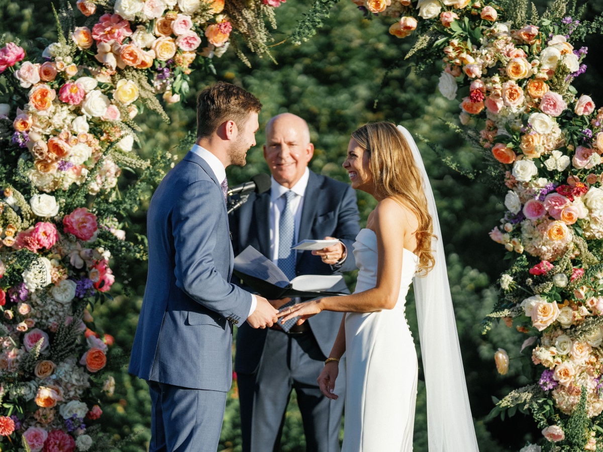 shades of pink and peach floral arch