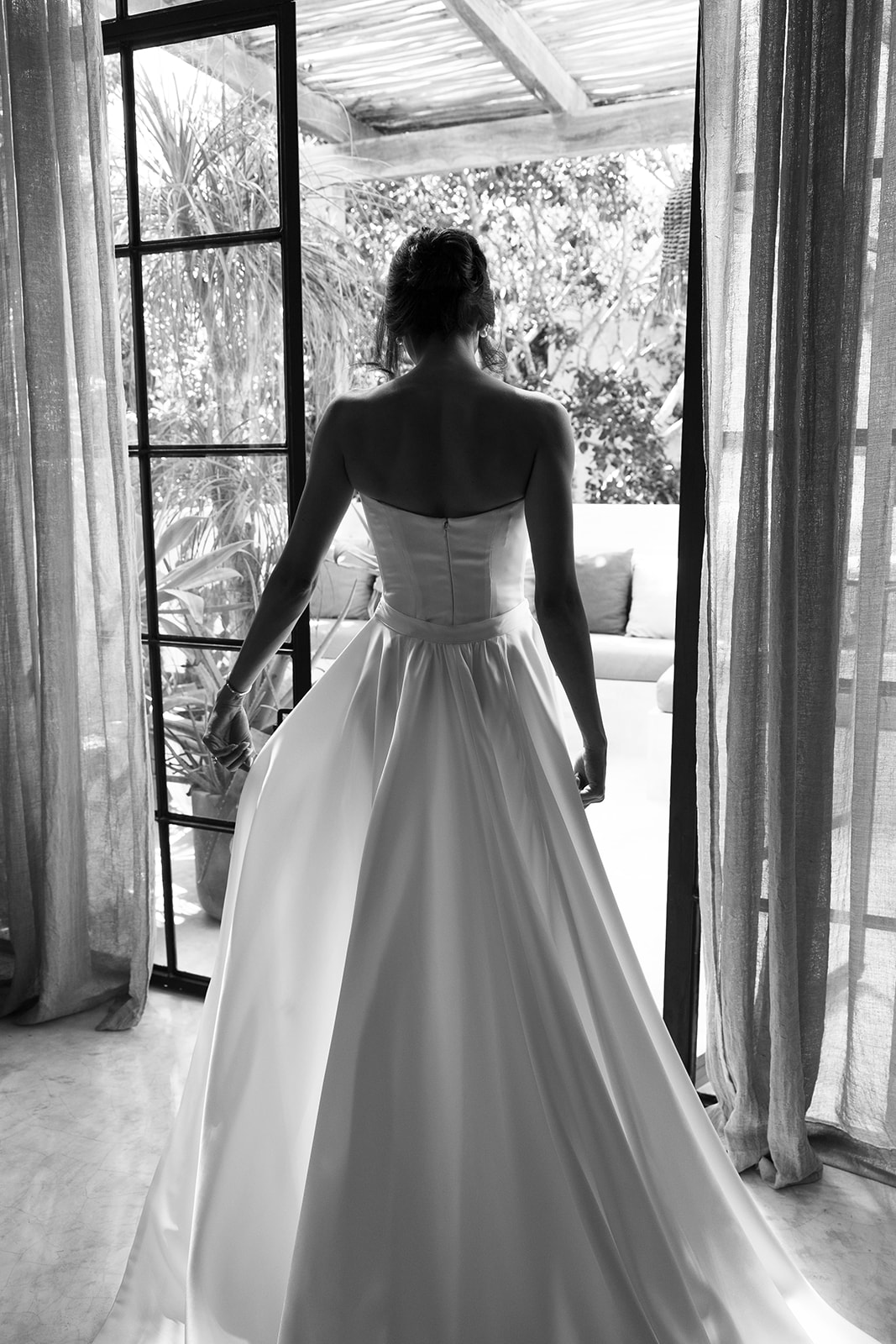 Back of Anna wedding dress with custom designed overskirt