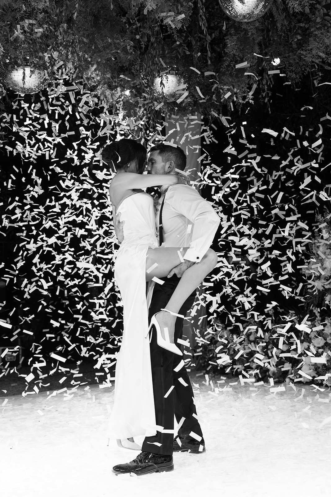 First dance on dance floor surrounded by confetti in Tulum 