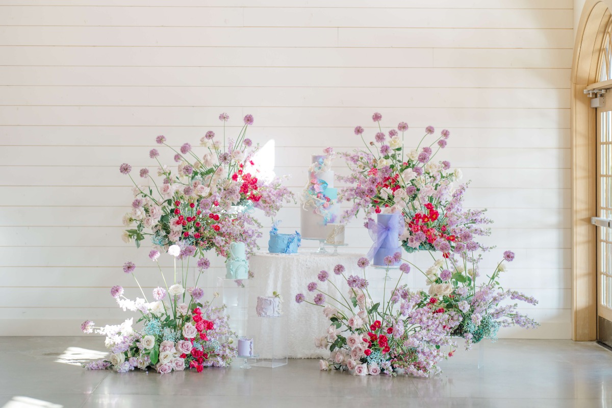 large floral arrangements for cake table