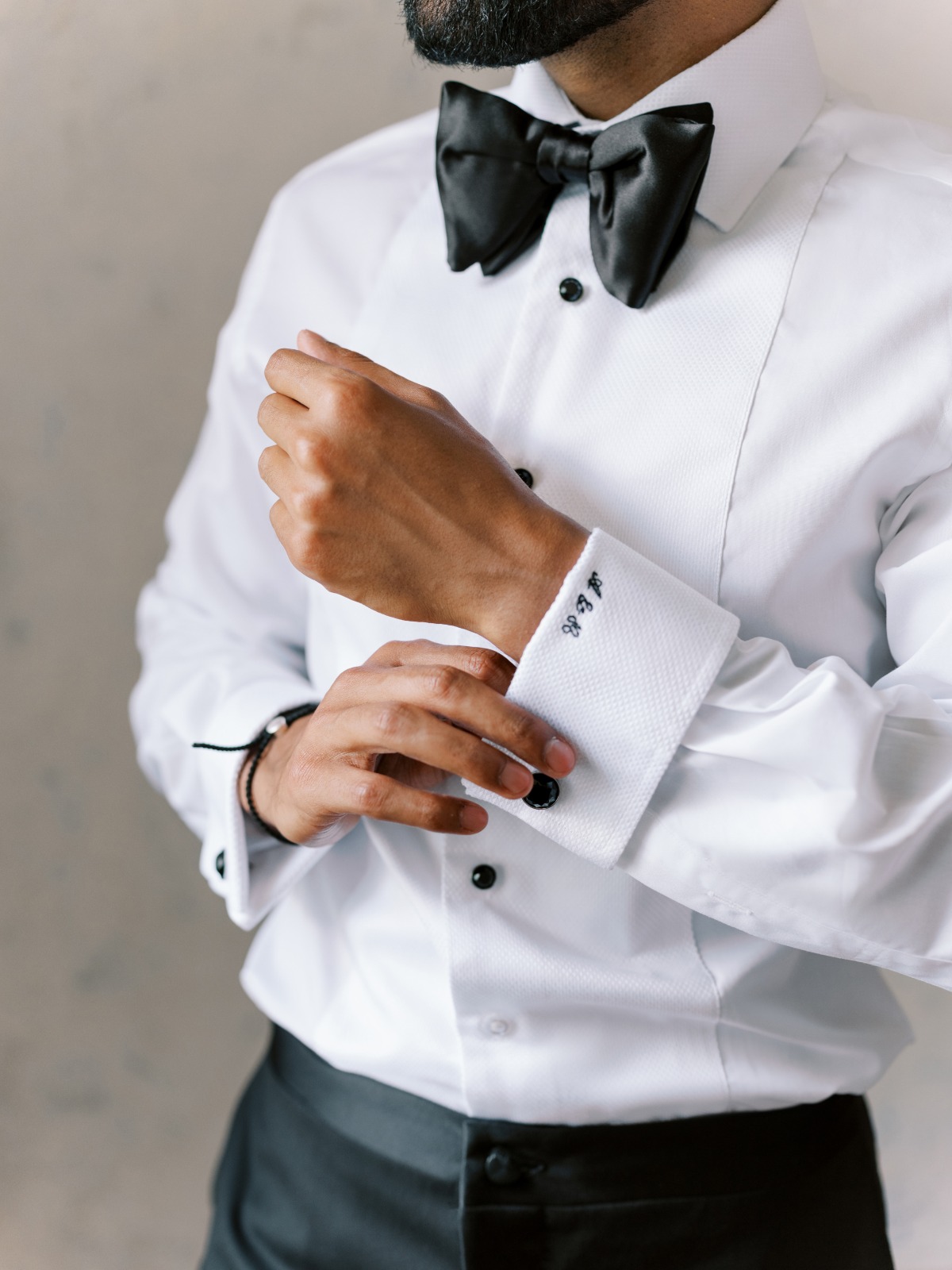 custom embroidered cuffs on tuxedo shirt