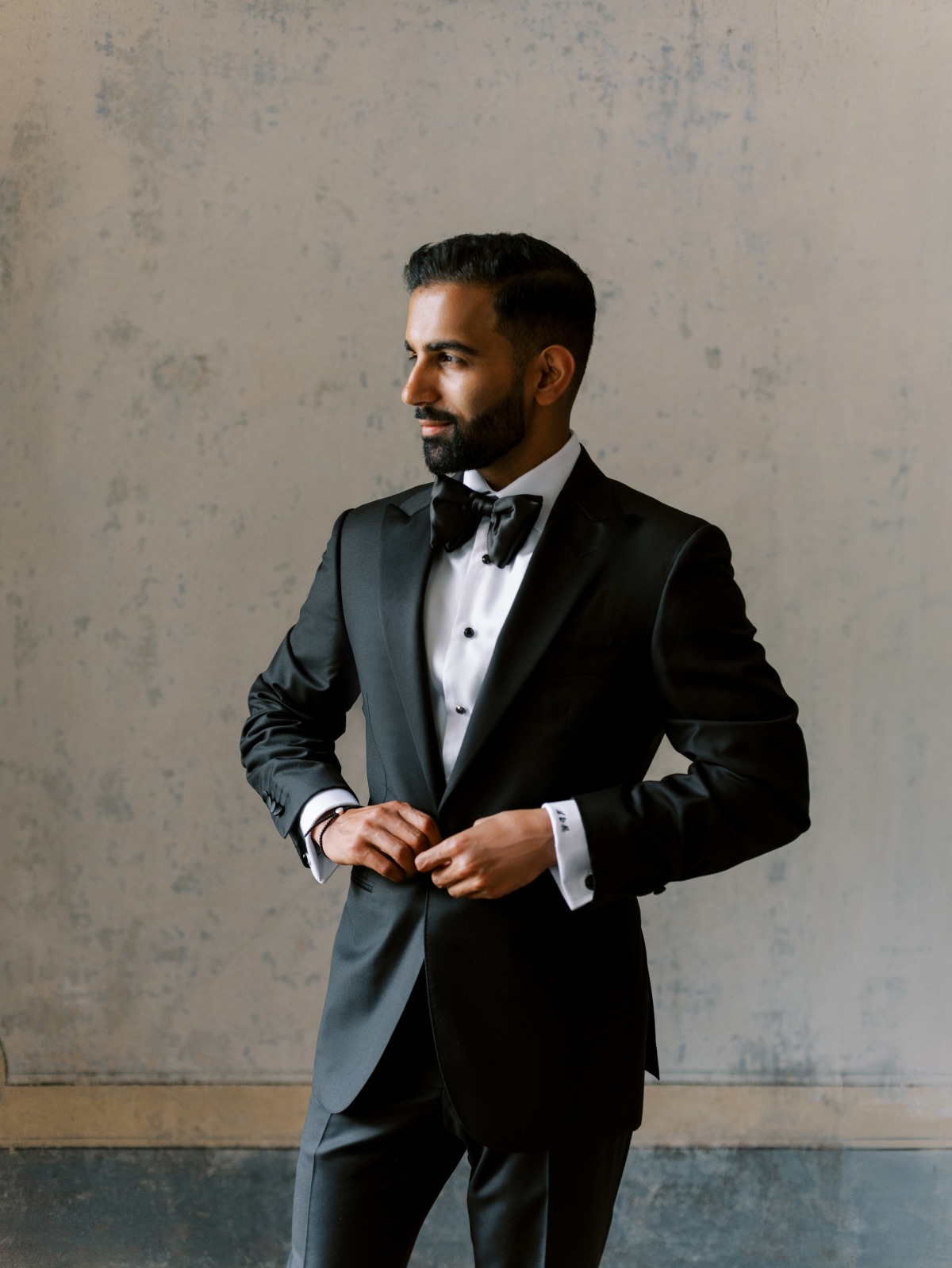 groom in cavali tuxedo