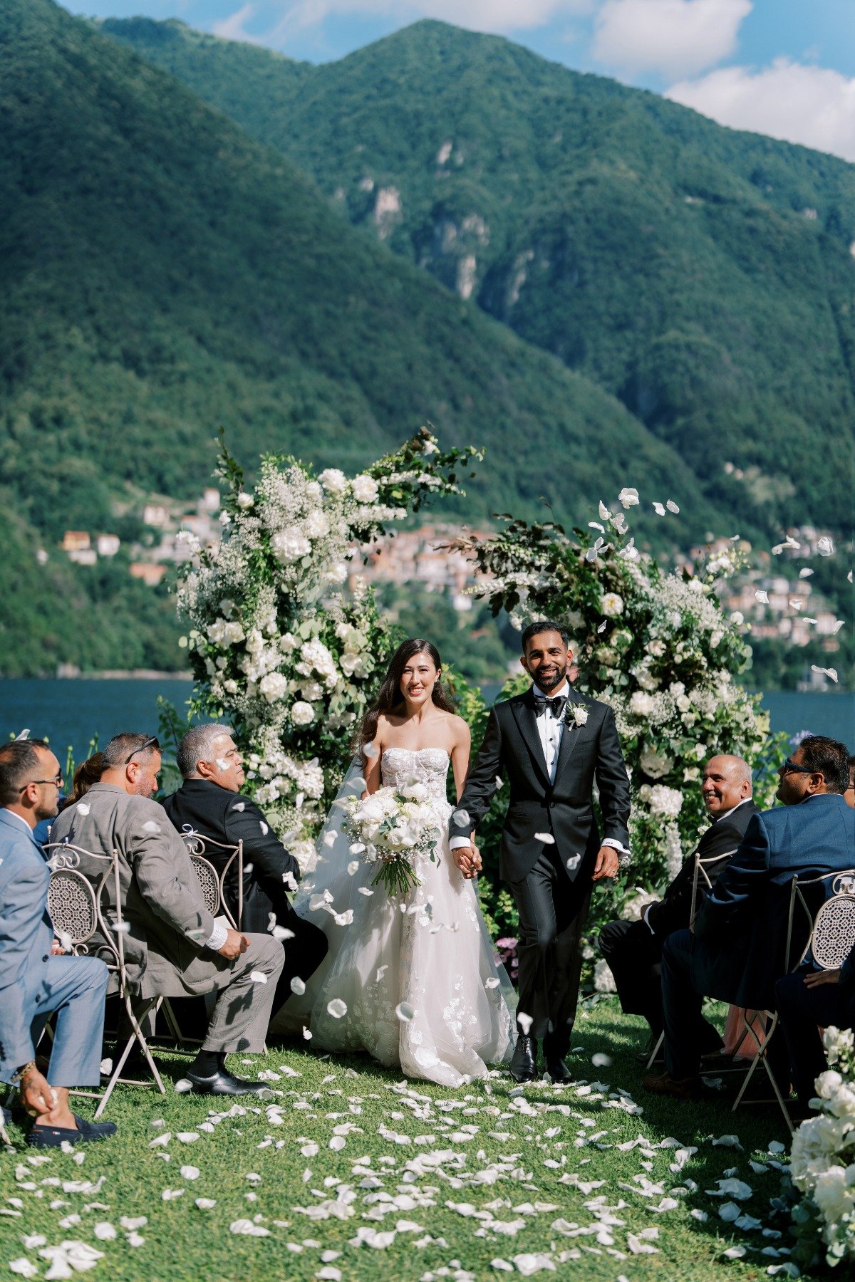 wedding ceremony on lake como with petal toss