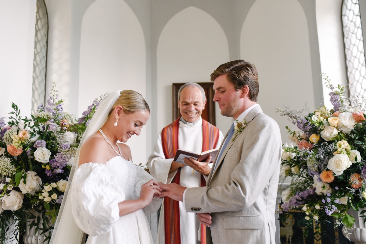 pastel wedding ceremony arrangements in large vases