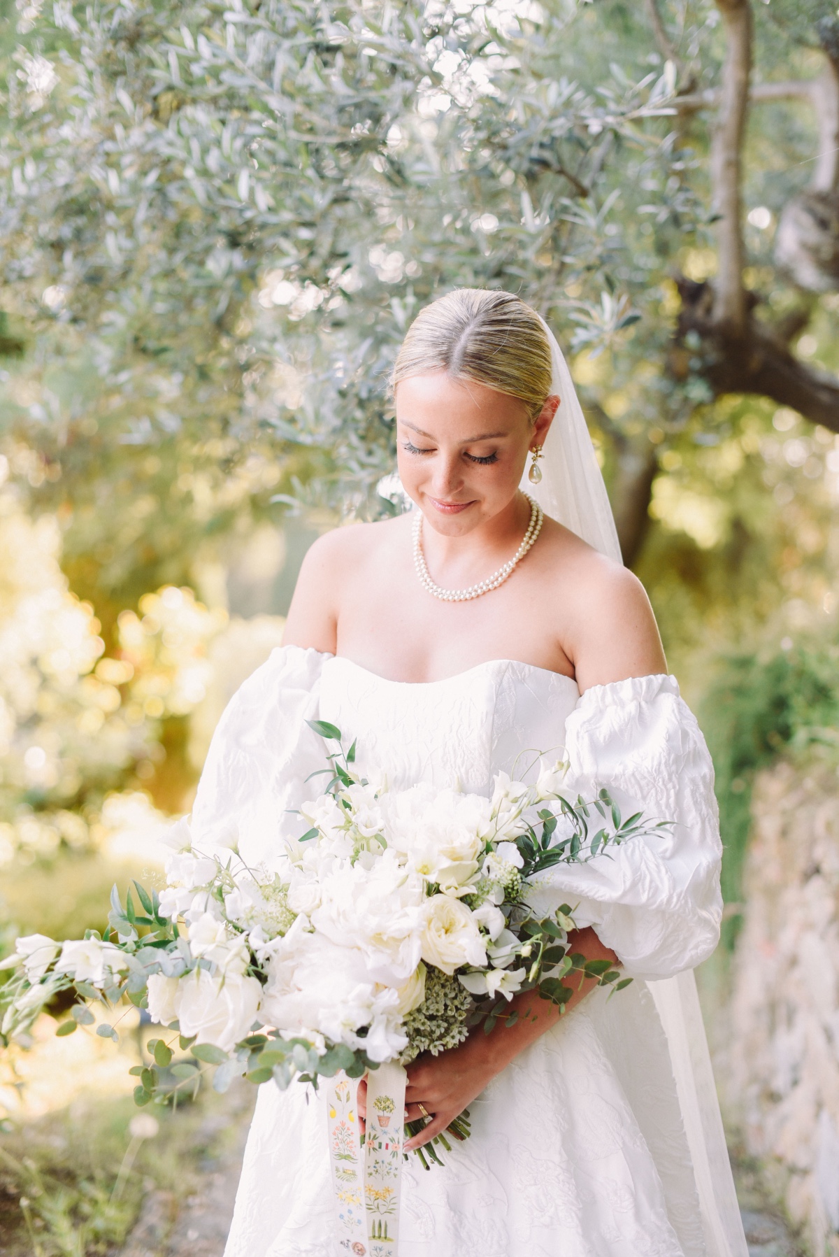 white rose and ranunculus bouquet