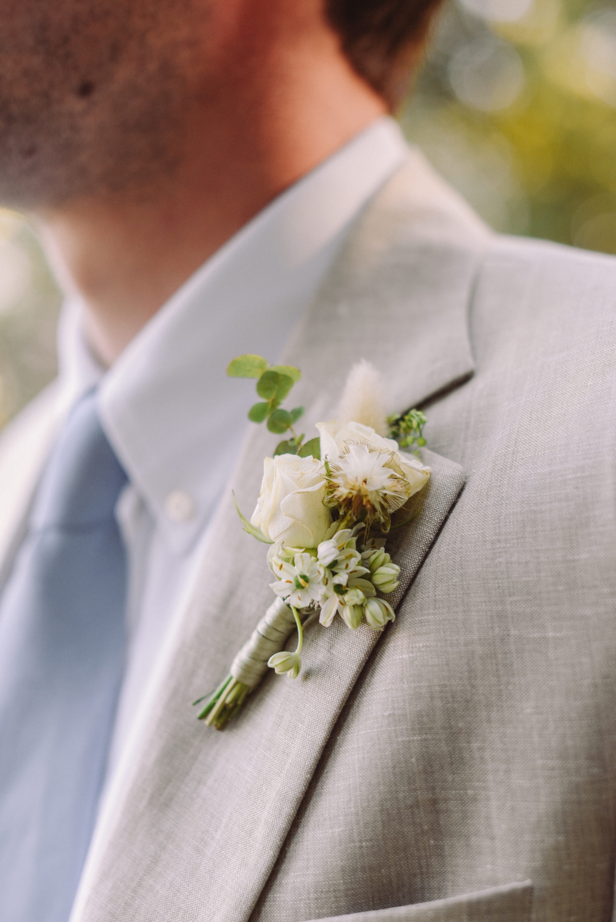 small white and green boutonniere