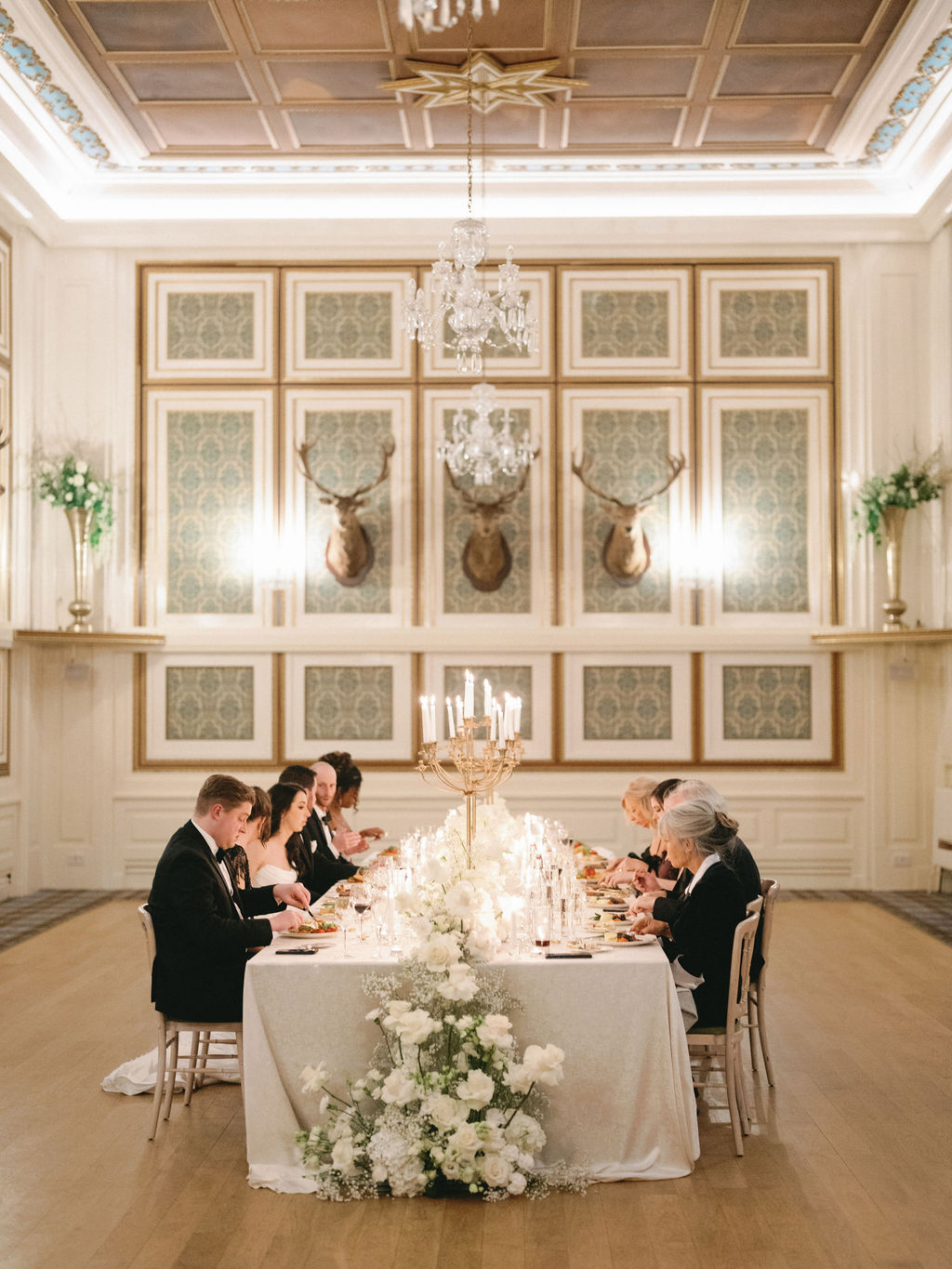 banquet table with overflowing flowers