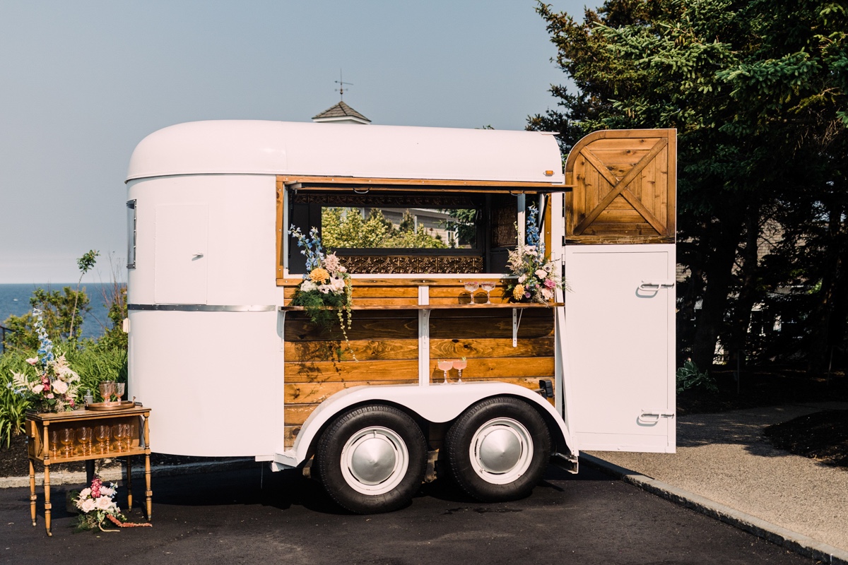 adorable mobile bar cart with custom cocktails