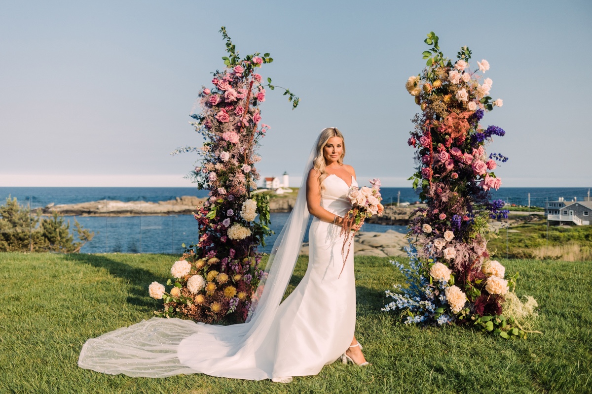 wedding bridal photography ideas by floral arch