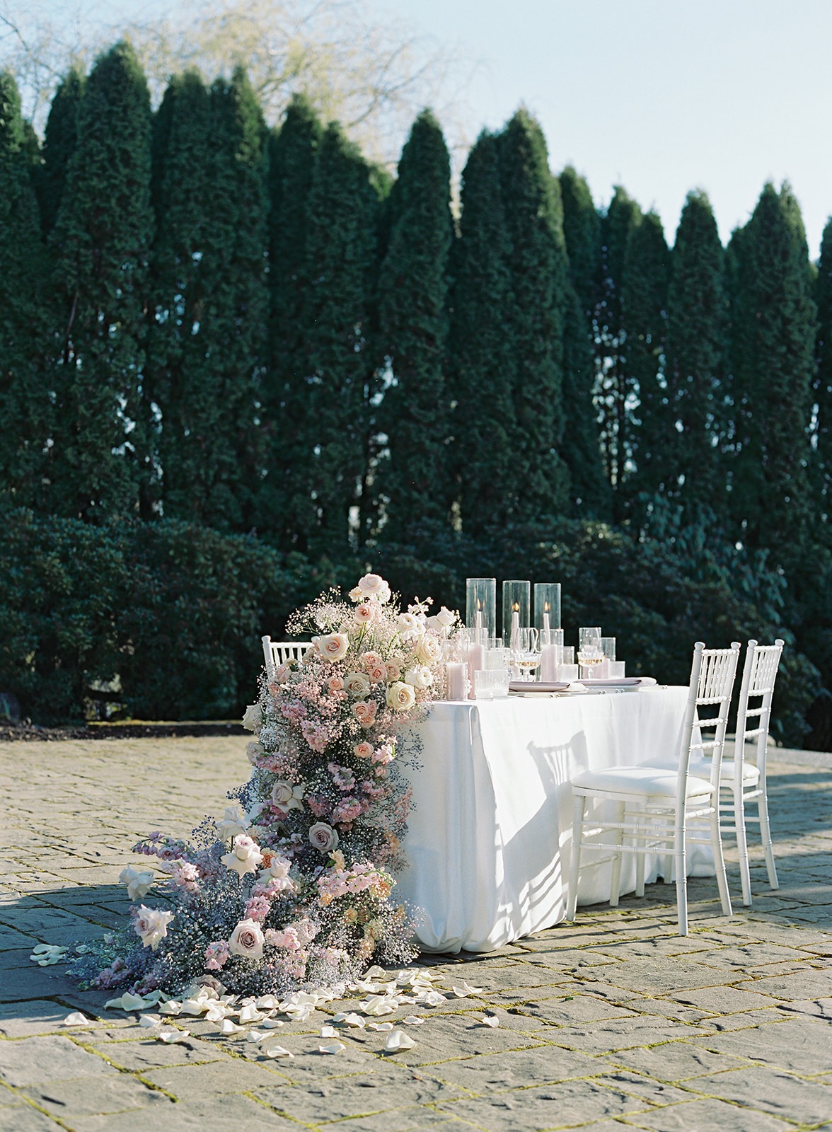 large cascading rose and baby's breath installation