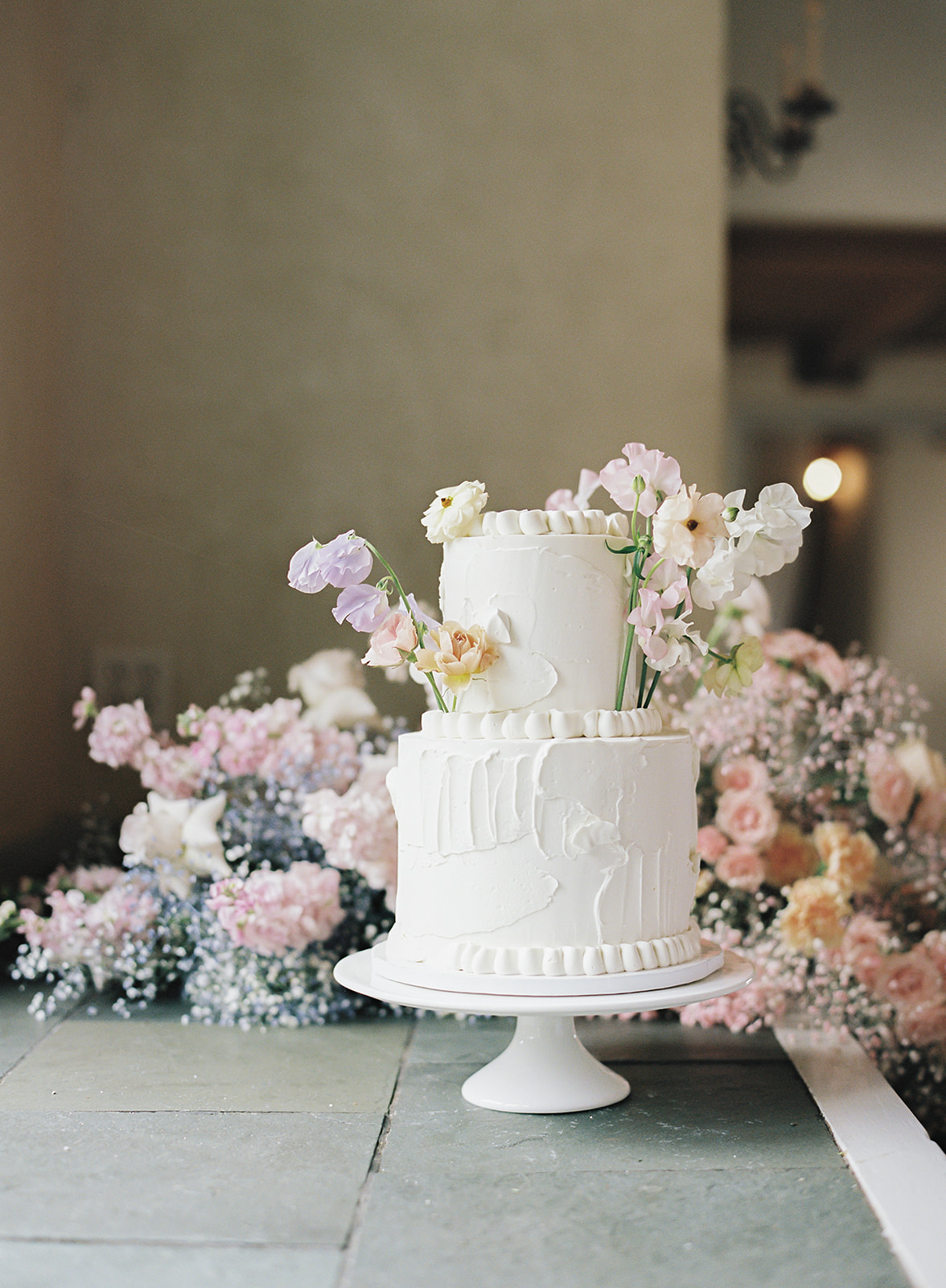 wedding cake with single stem accents