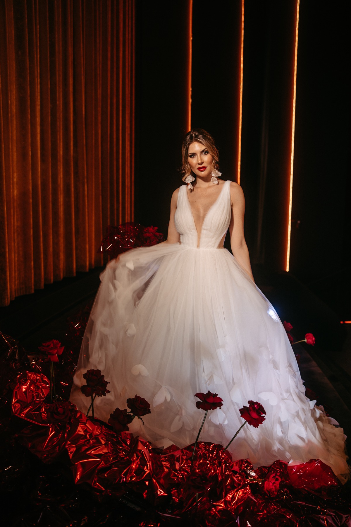 tulle wedding dress with statement earrings