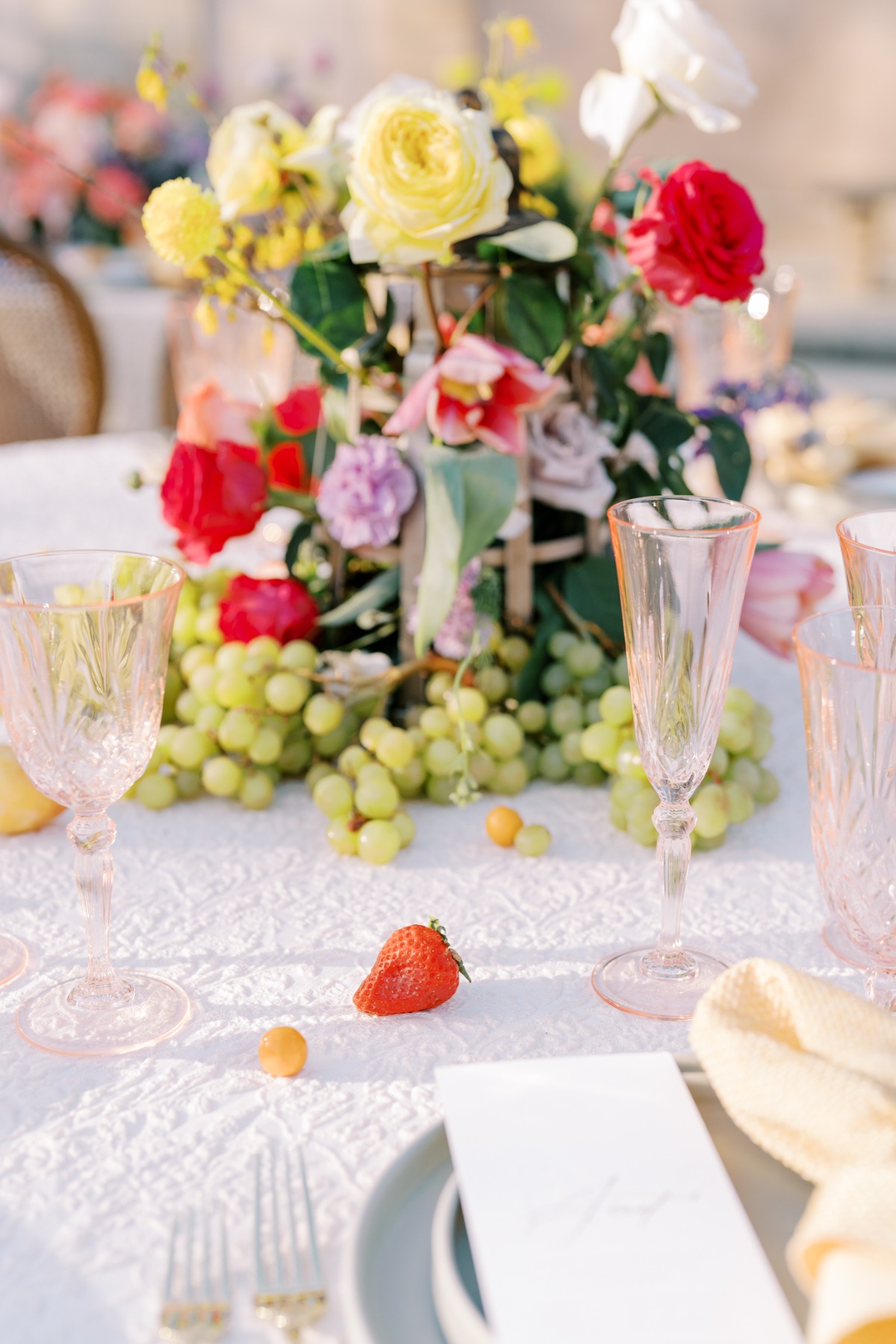 Vibrant and colorful wedding reception table setting 