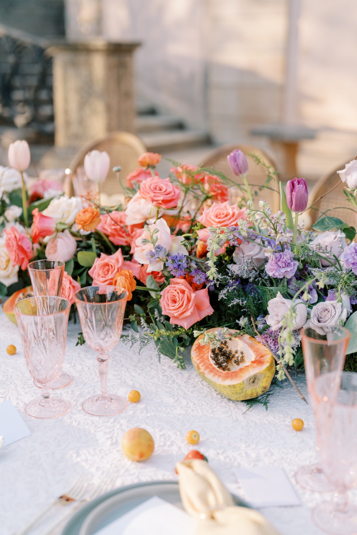 Pastel color blocked centerpieces with fresh fruit 