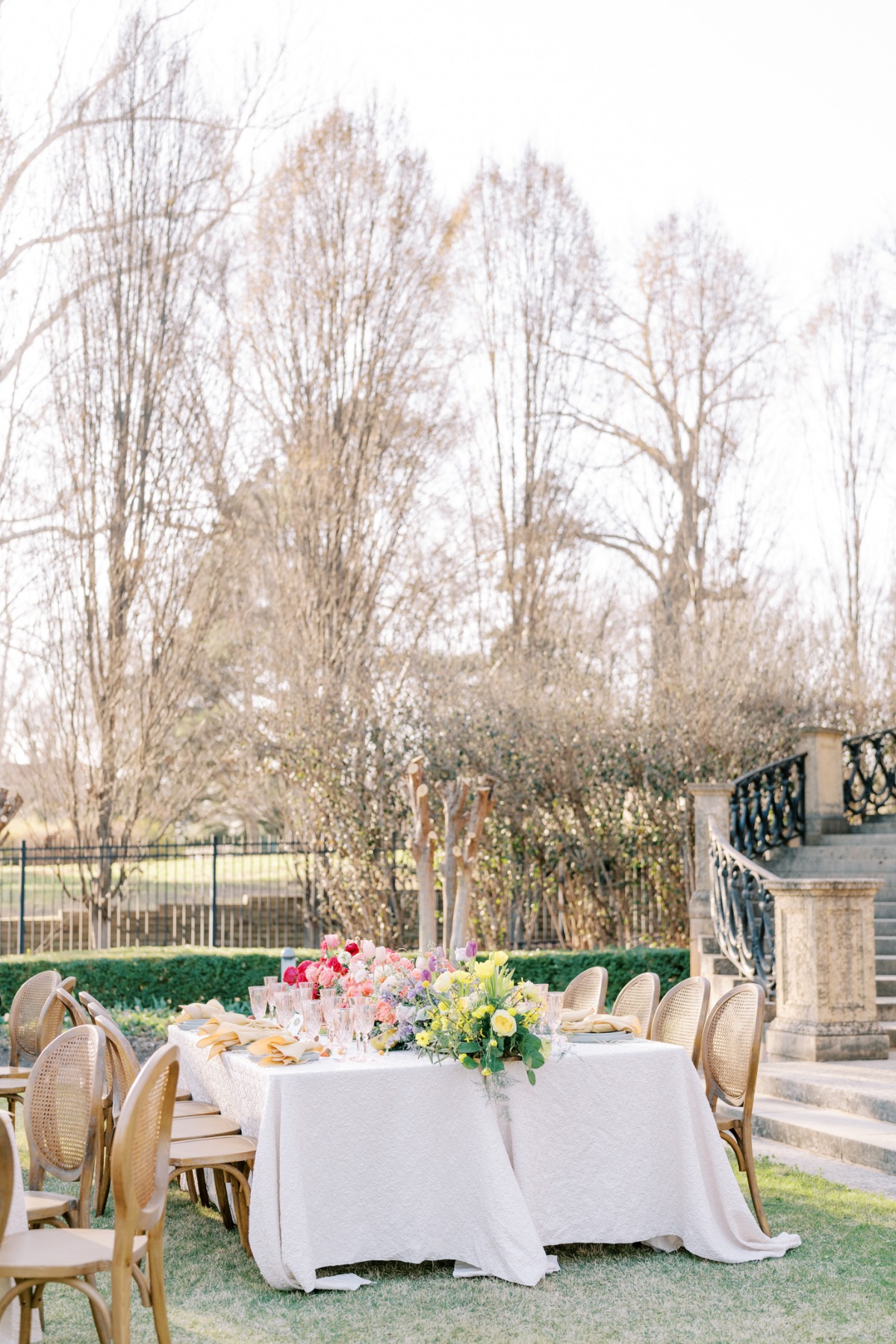 Pastel rainbow color blocked wedding reception tables 