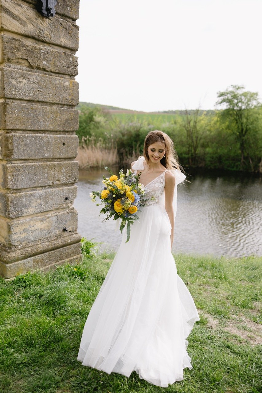 chiffon tied bow shoulder wedding dress