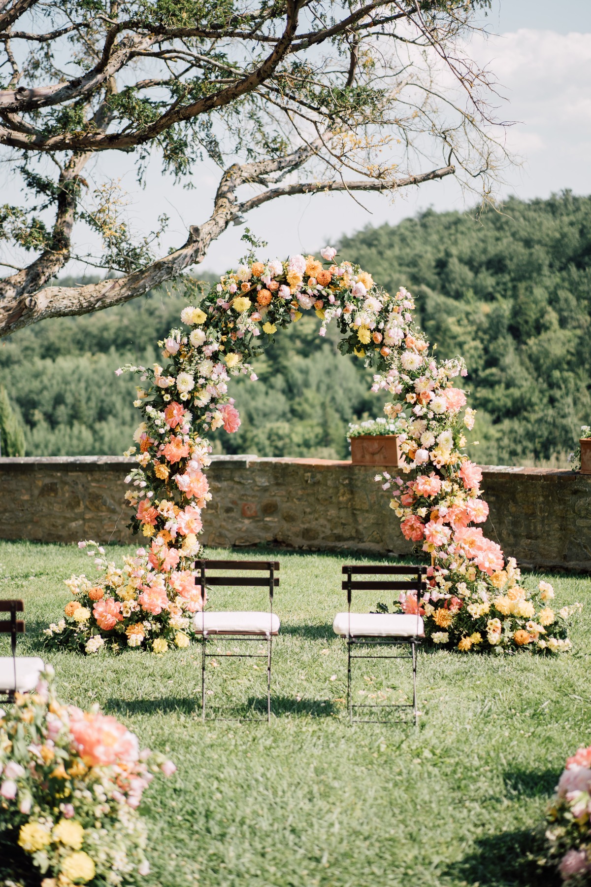 peach yellow and cream floral arch