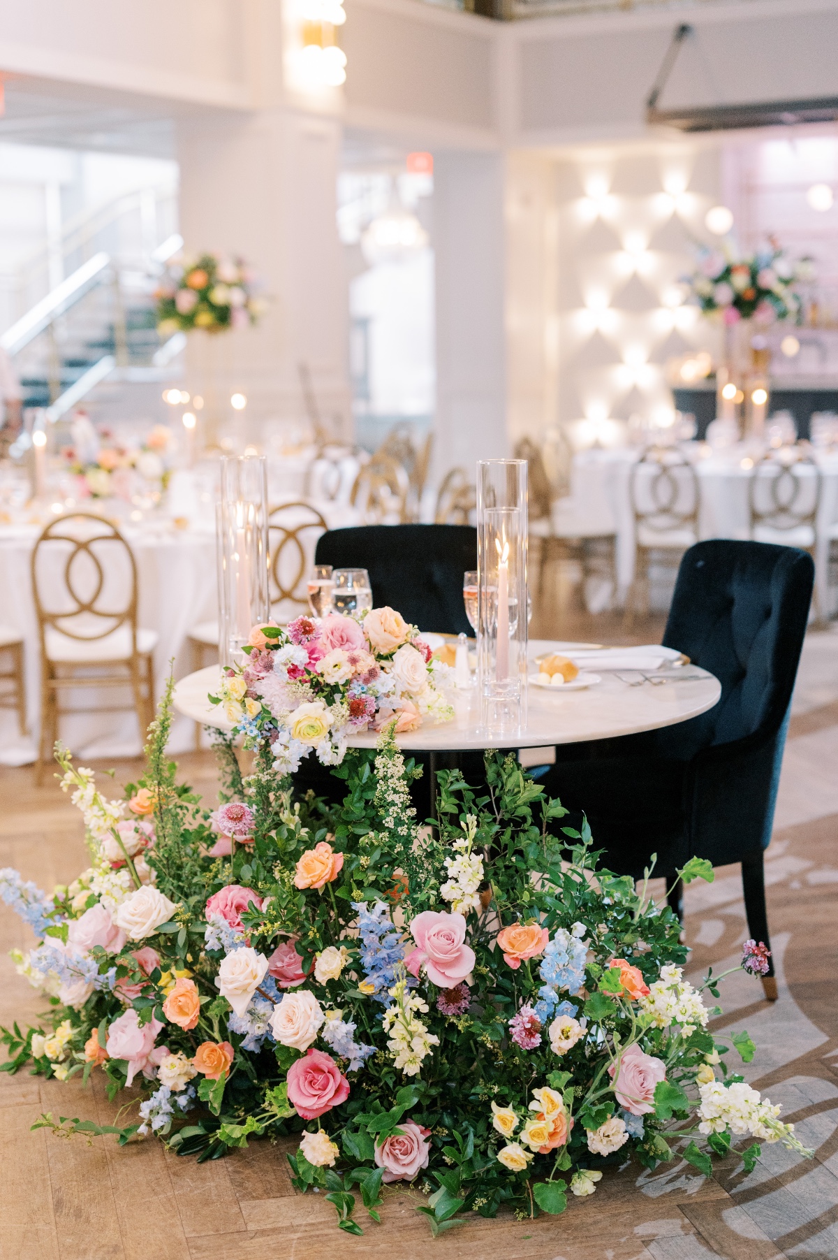 large rainbow floral floor arrangement