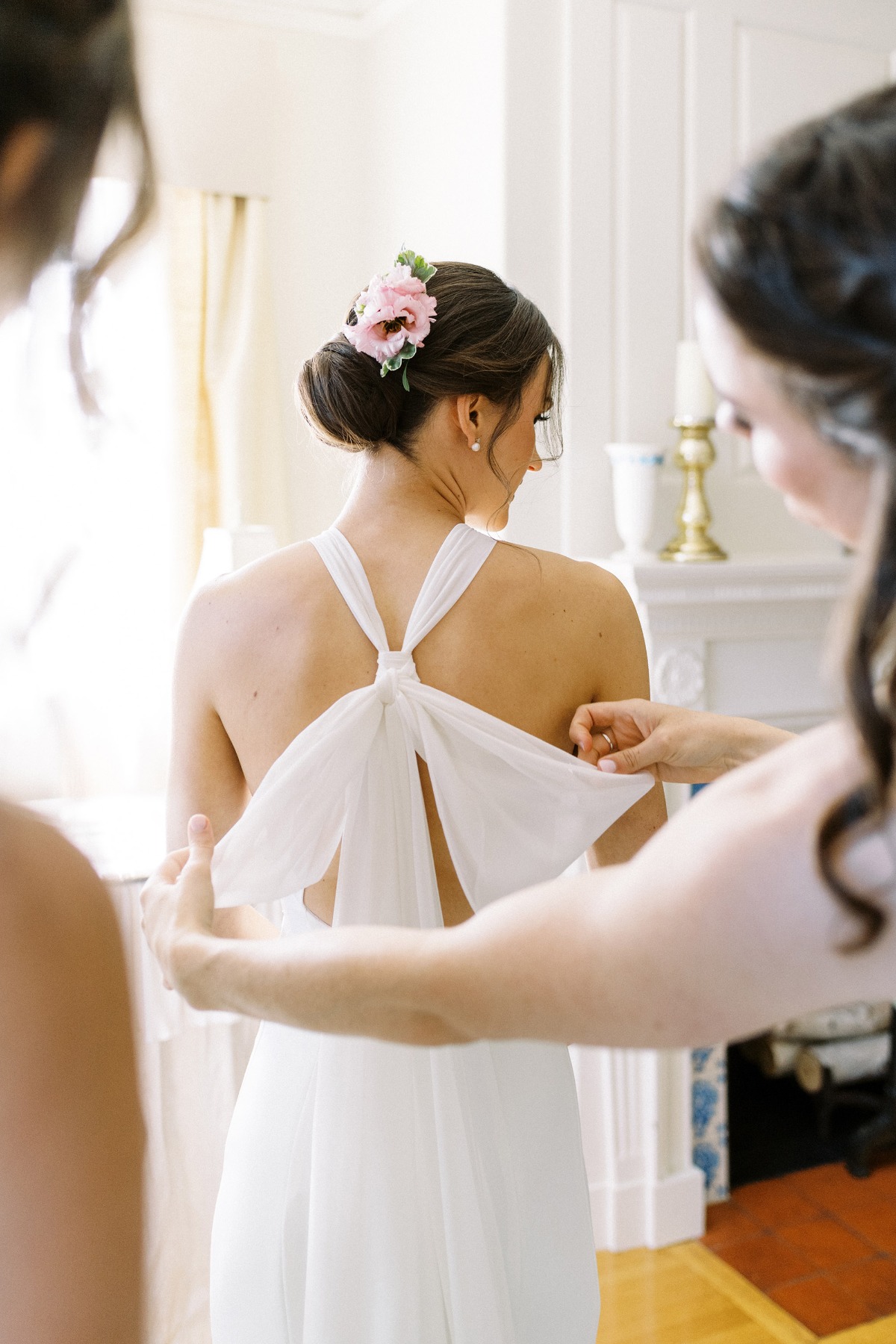 wedding gown with a bow on the back