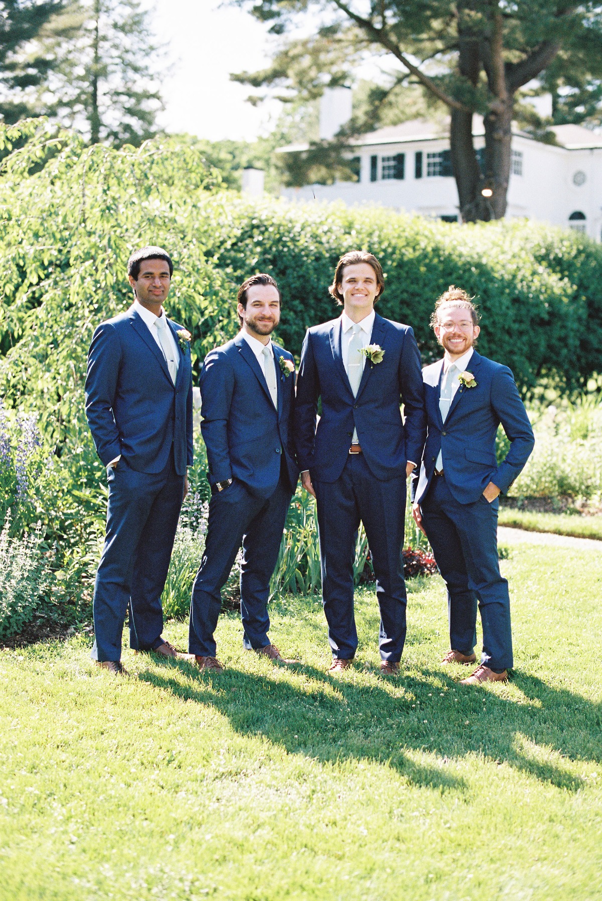 groom and his groomsmen in blue suits