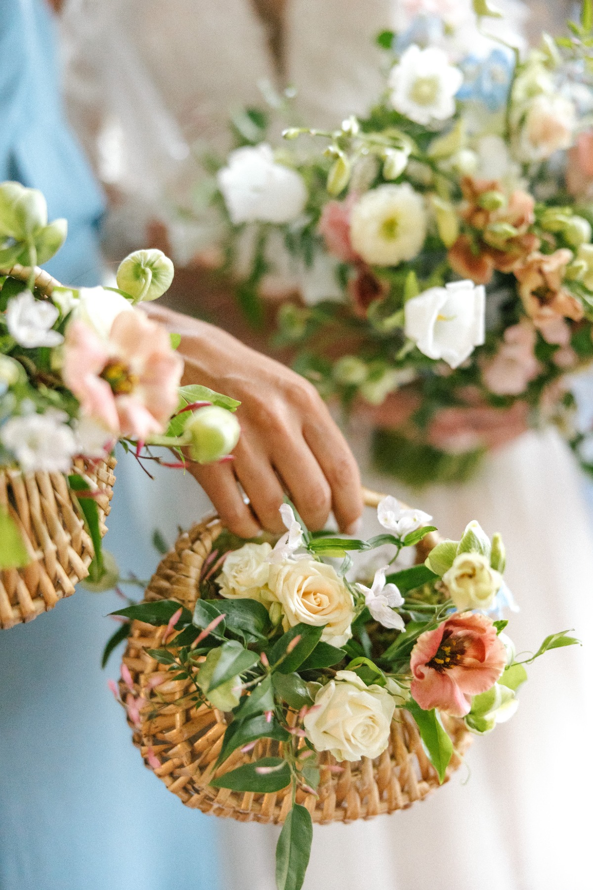 bridesmaids with flower baskets