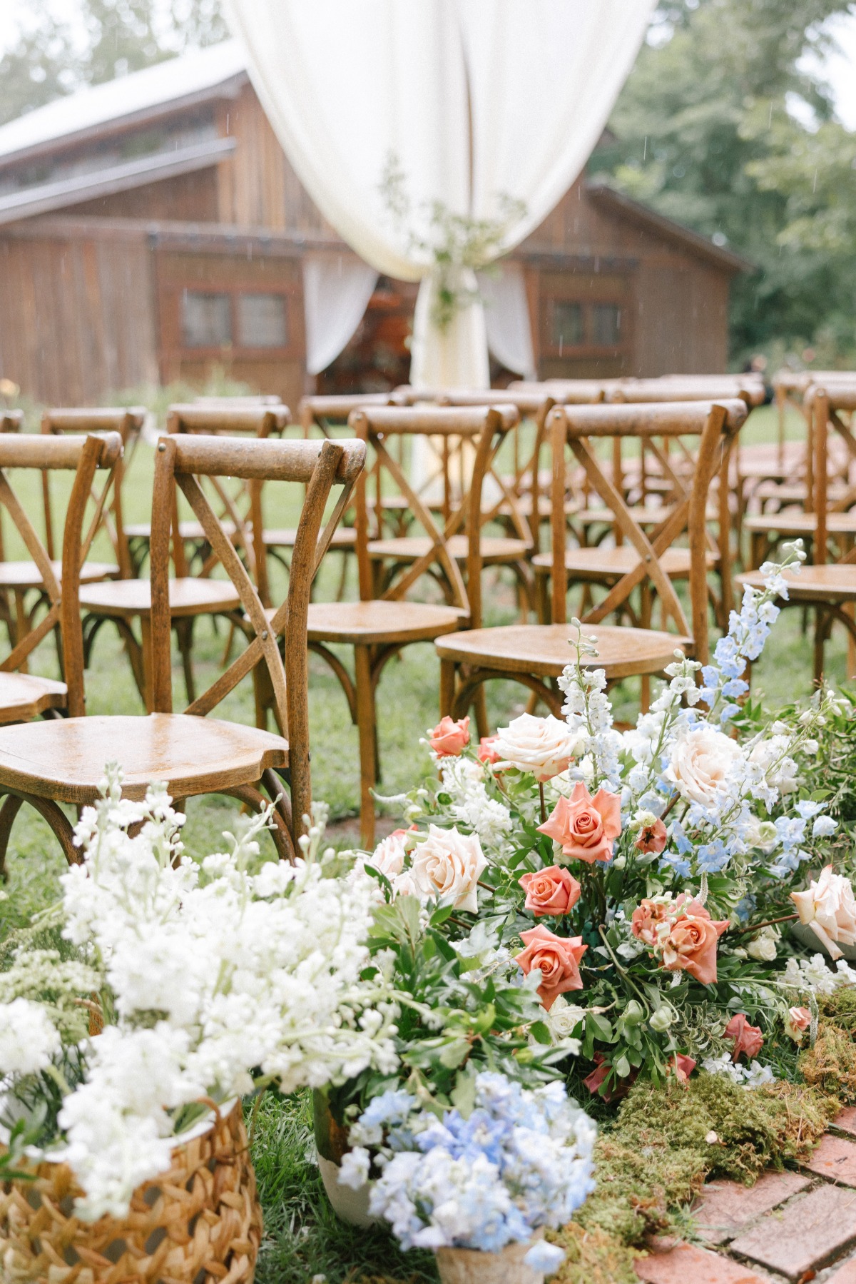 wood farm chairs for draped outdoor ceremony