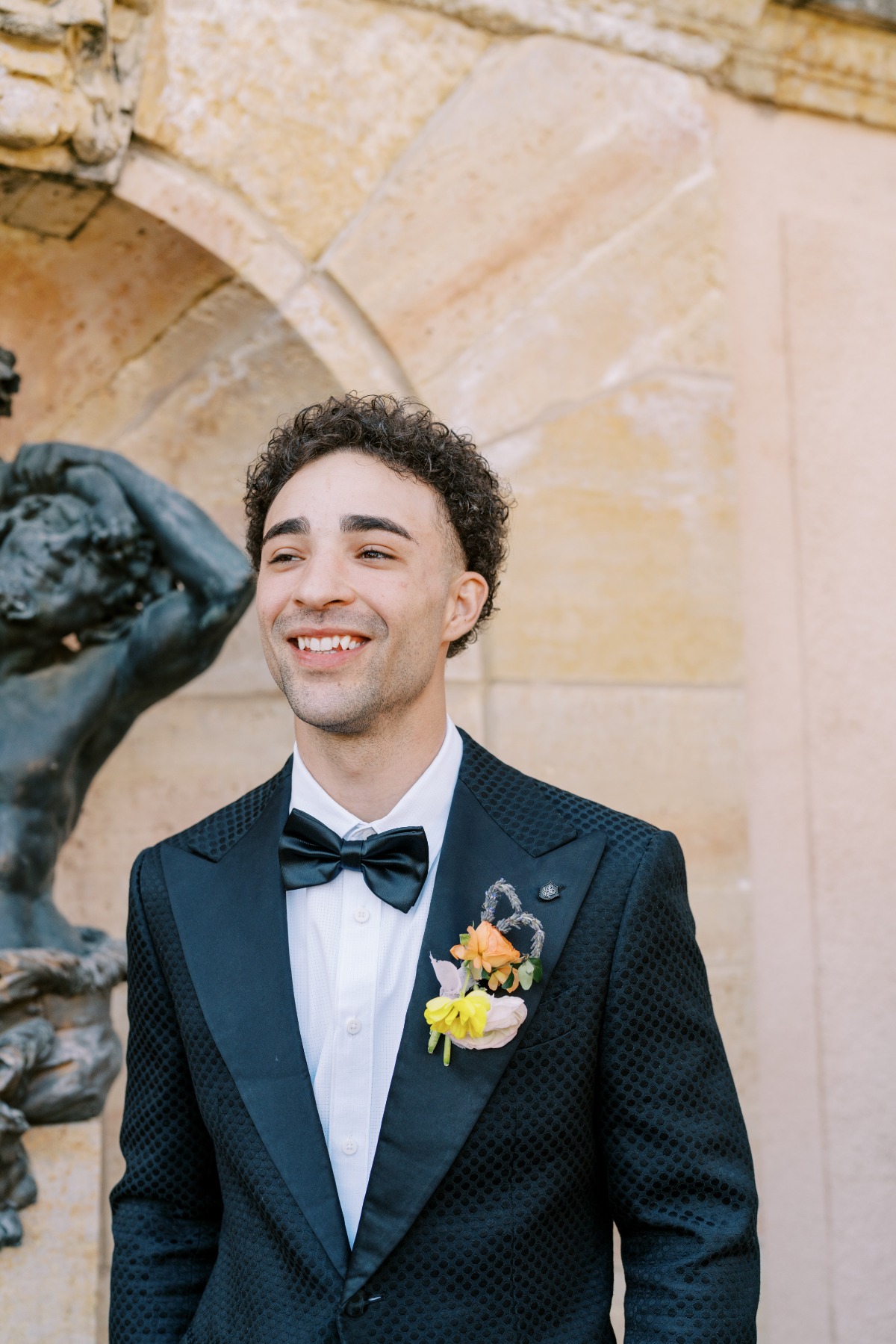 Modern groom in unique designer textured wedding tuxedo 