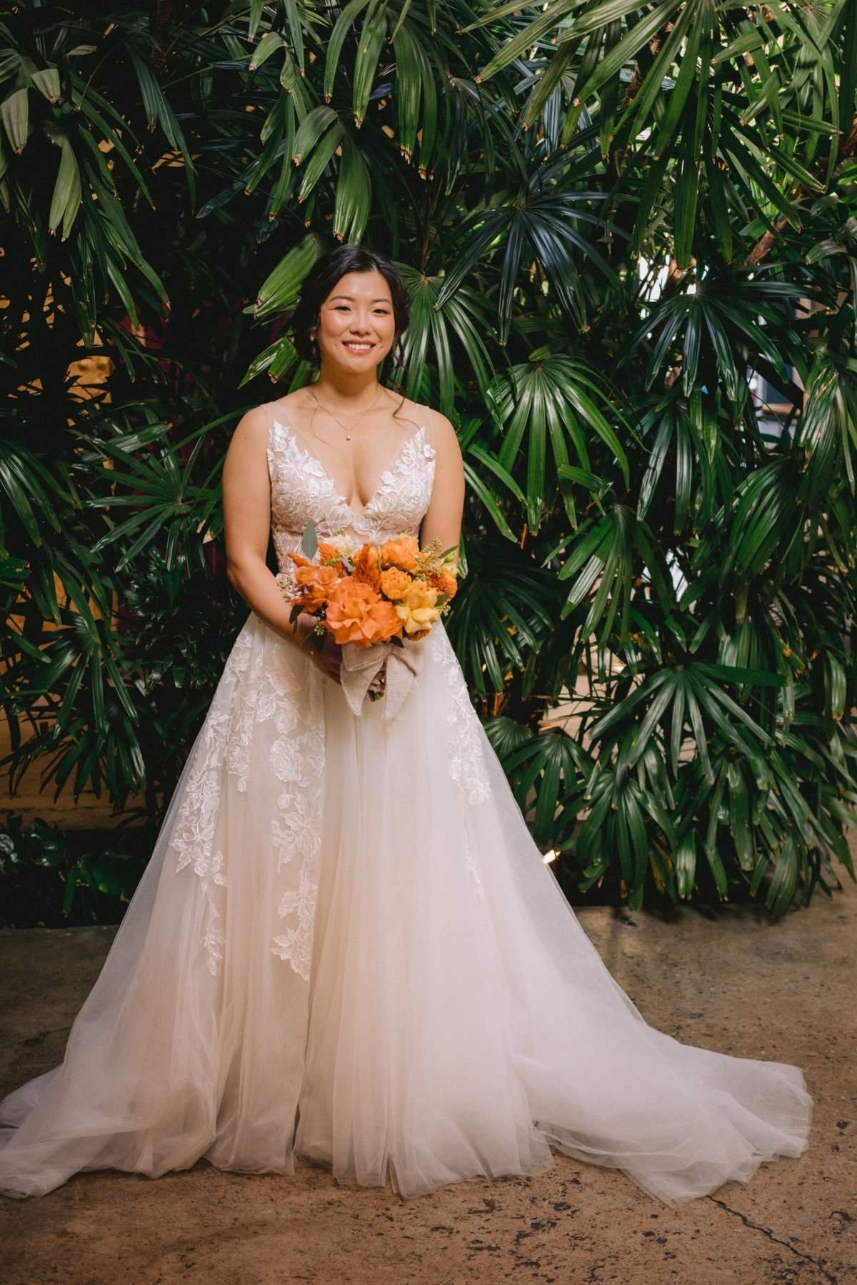 a line wedding gown with lace illusion neckline