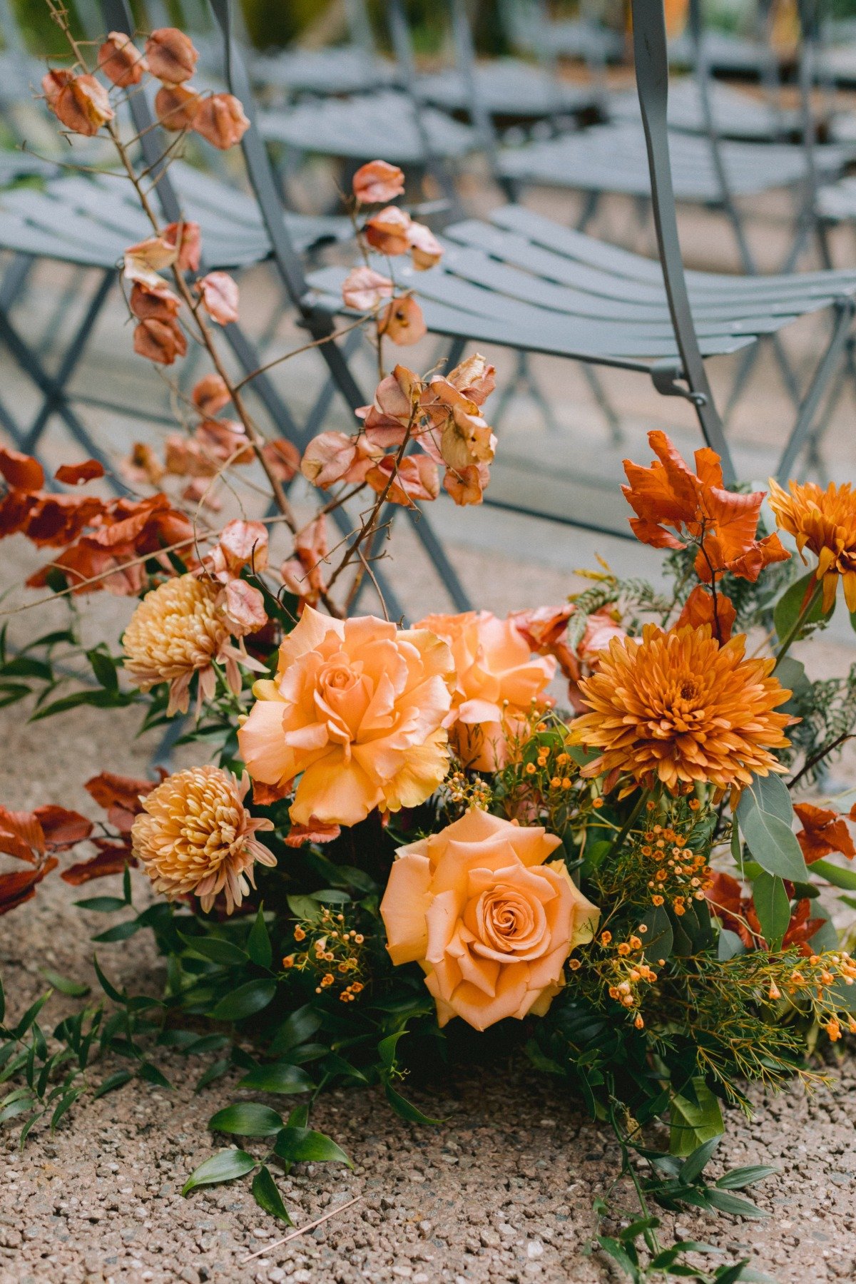 orange wedding ceremony flower arrangements