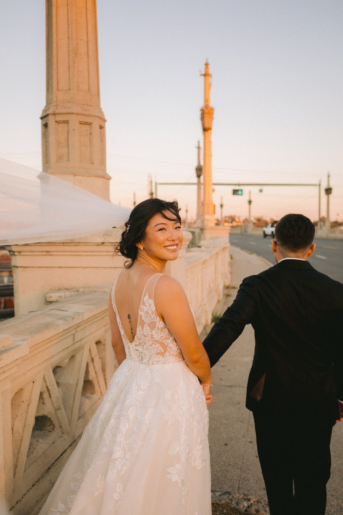 bride and groom walking in the streets of LA