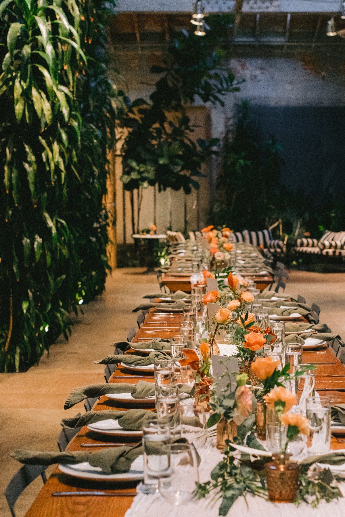 wedding reception with a ton of greenery in LA