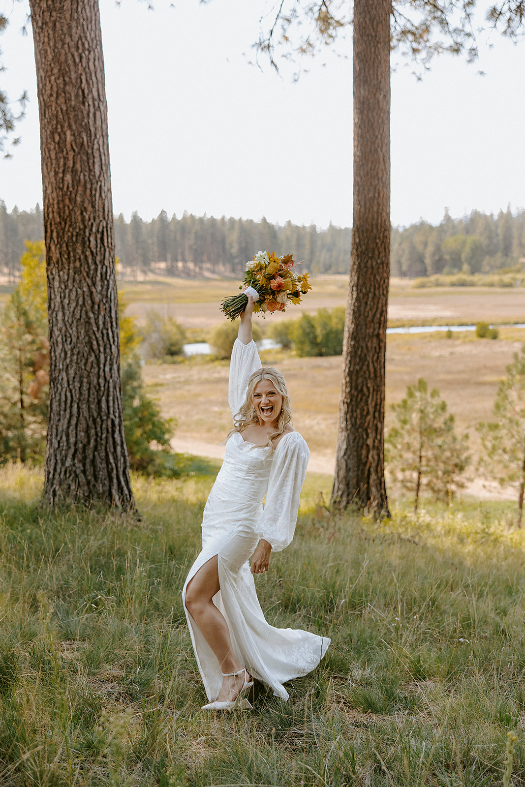 bride in long sleeve boho wedding gown