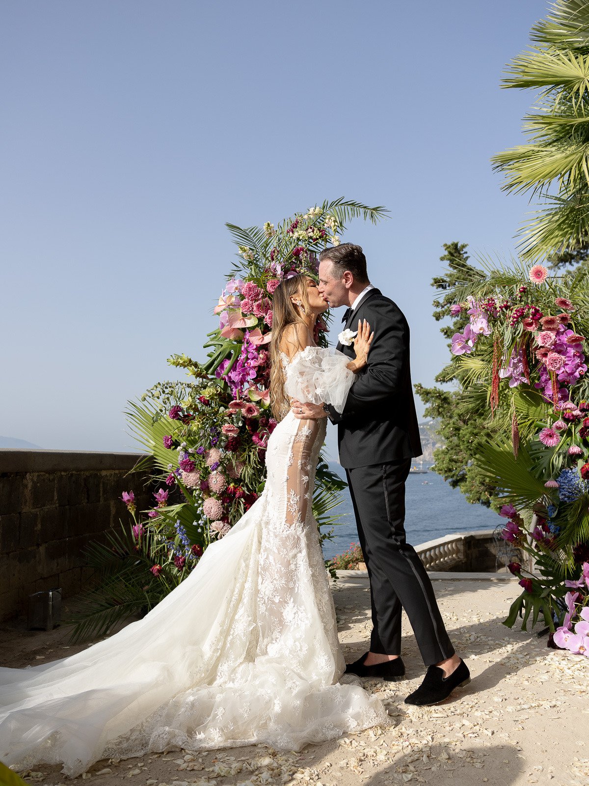 asymmetrical tropical floral arch