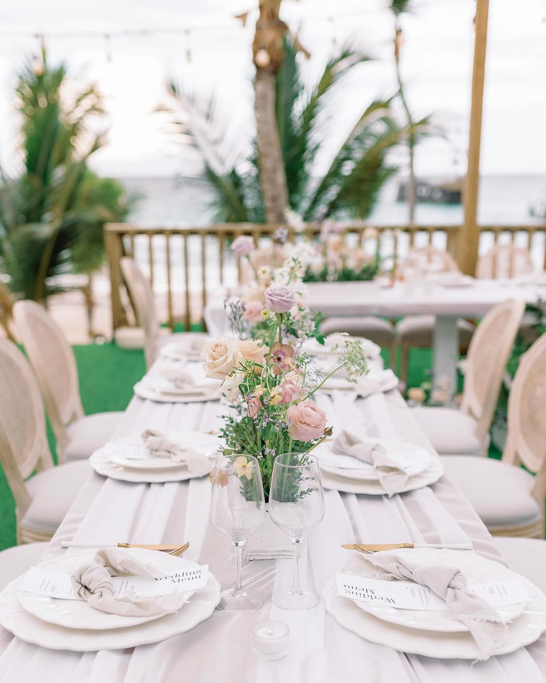 pastel beach wedding with travel by destination wedding in Mexico planned by Barefoot Bridal