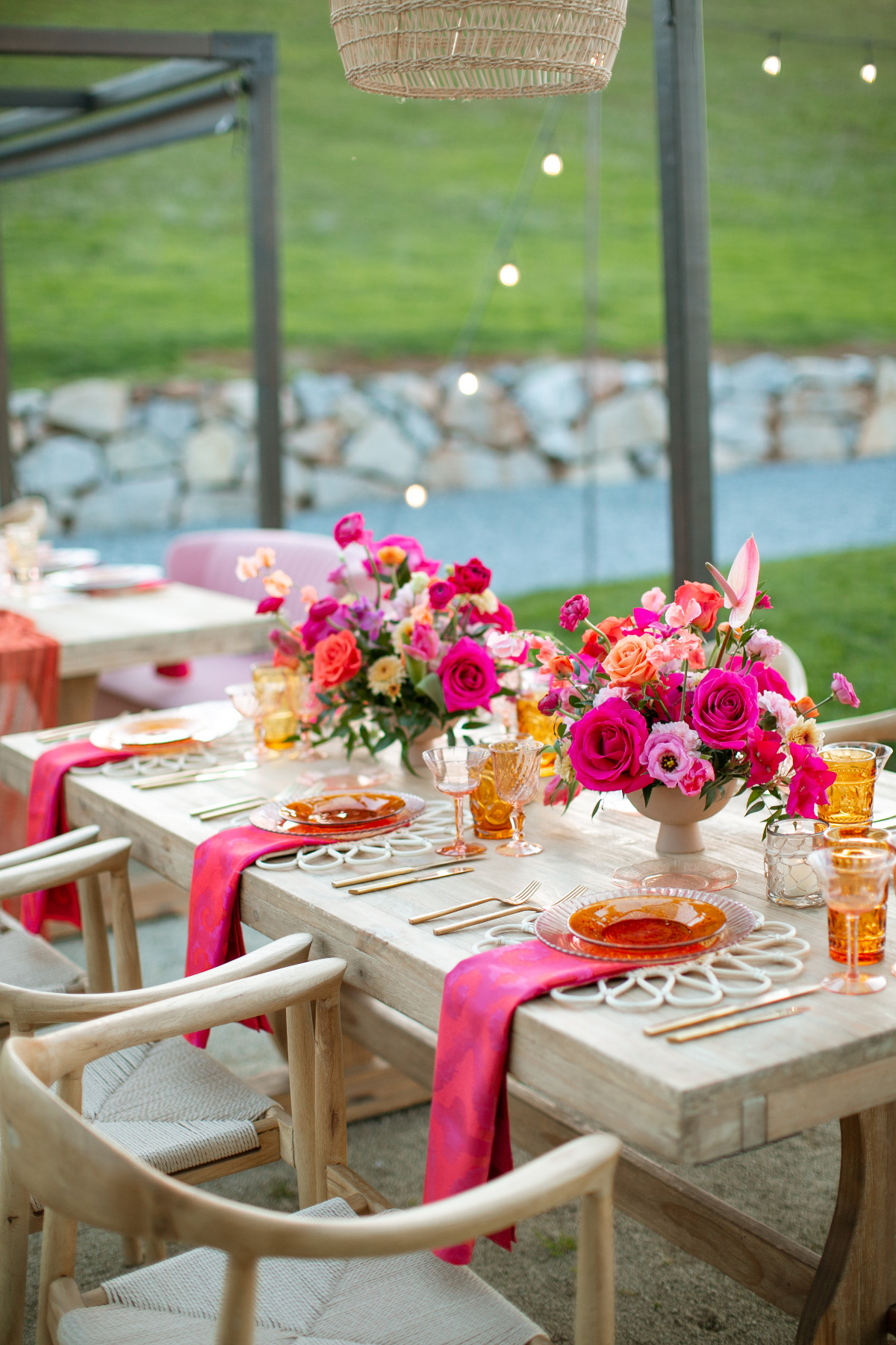 pink and orange reception tables