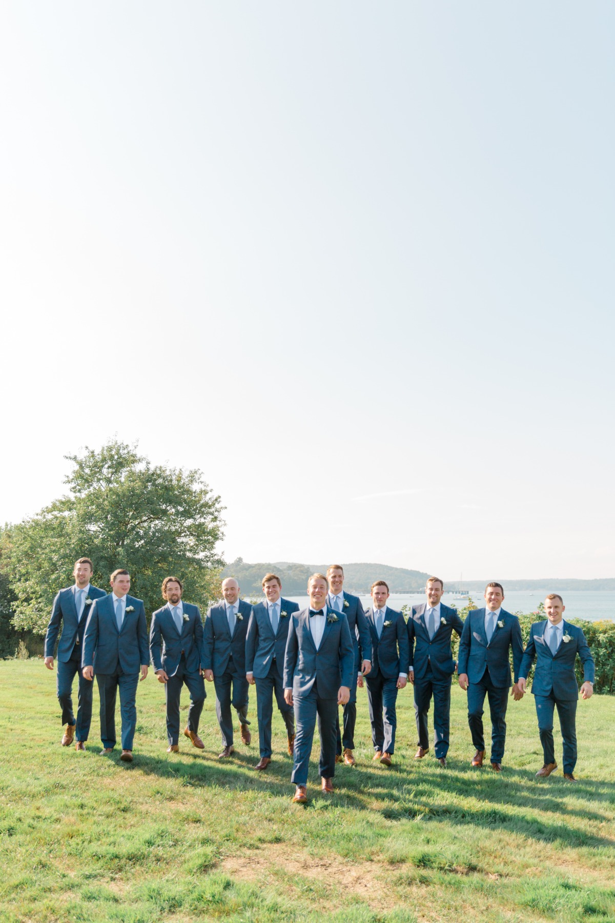 groom and groomsmen in blue suits