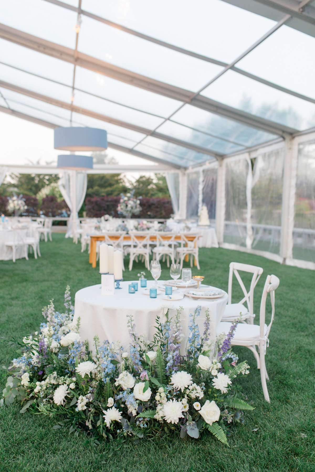 blue lavender and white tented reception sweetheart table