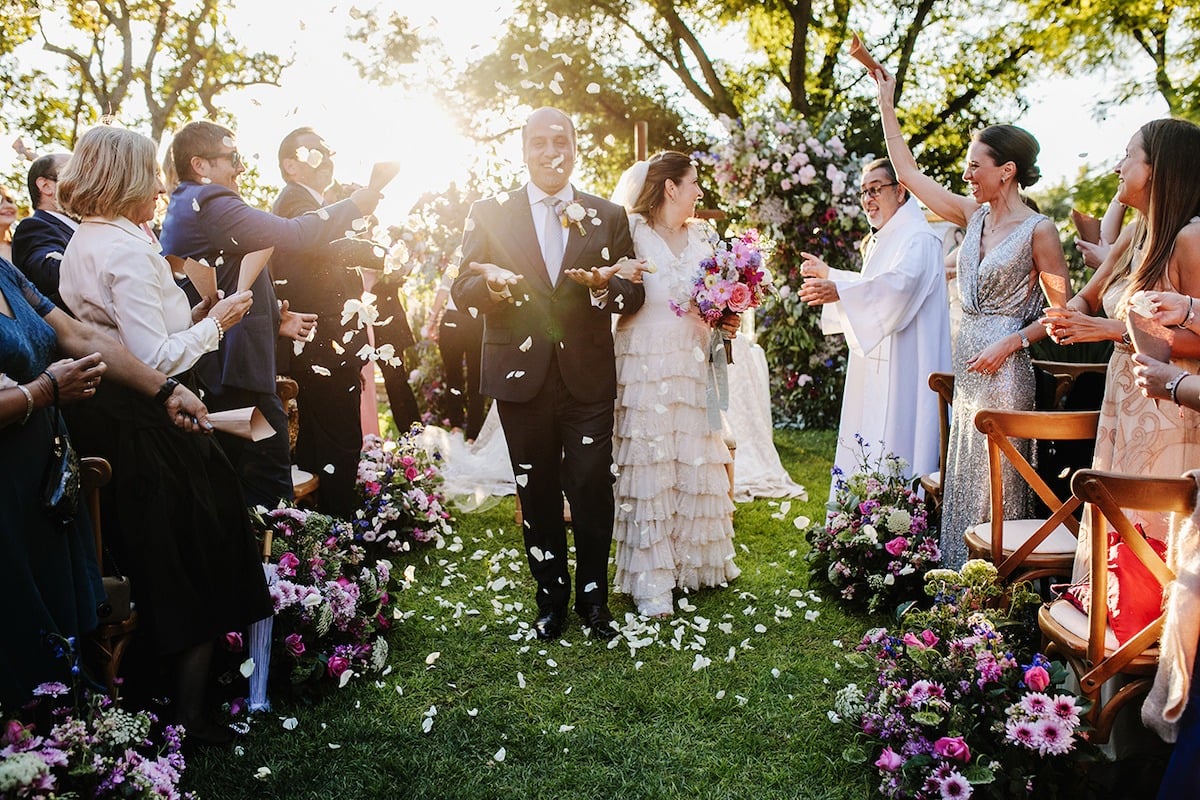 bride and groom flower petal exit from wedding ceremony