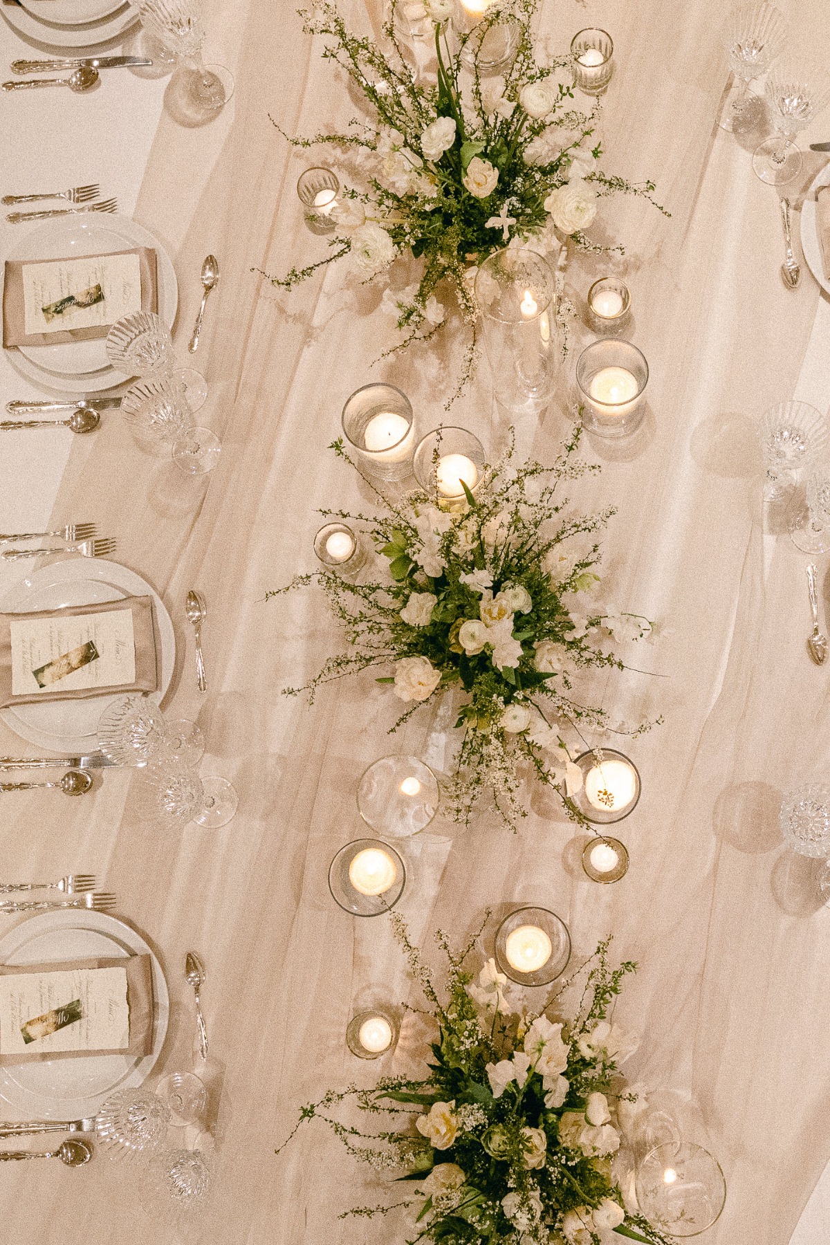 white and greenery centerpieces