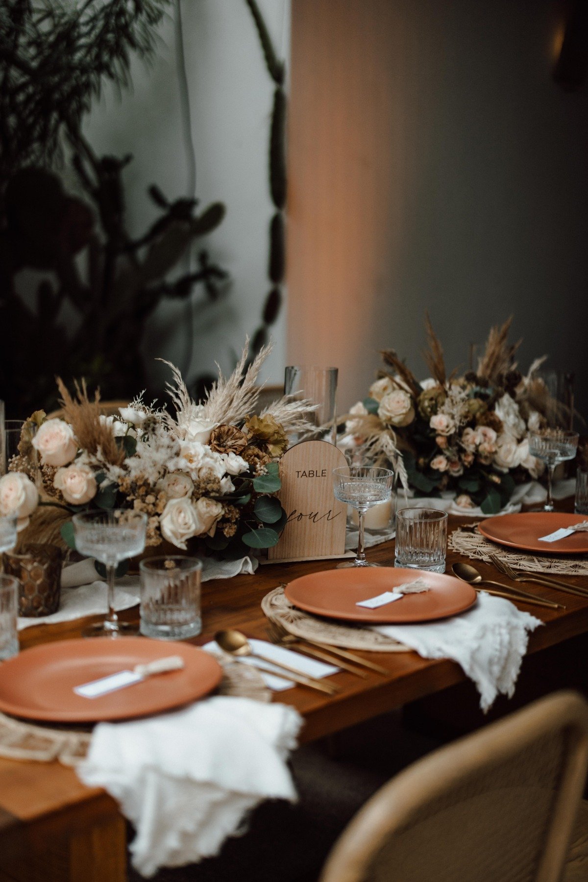 Modern wood and terracotta inspired wedding table