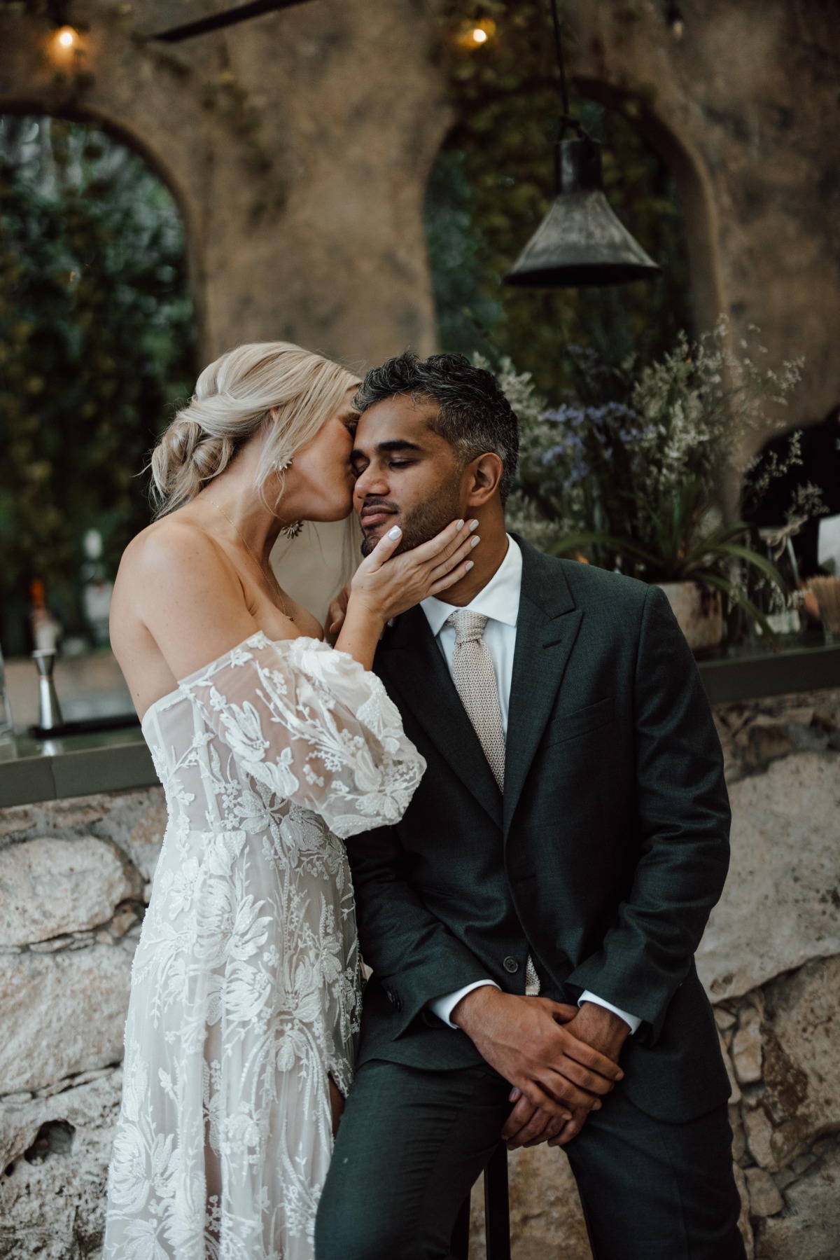 Tulum bride and groom kissing after first look