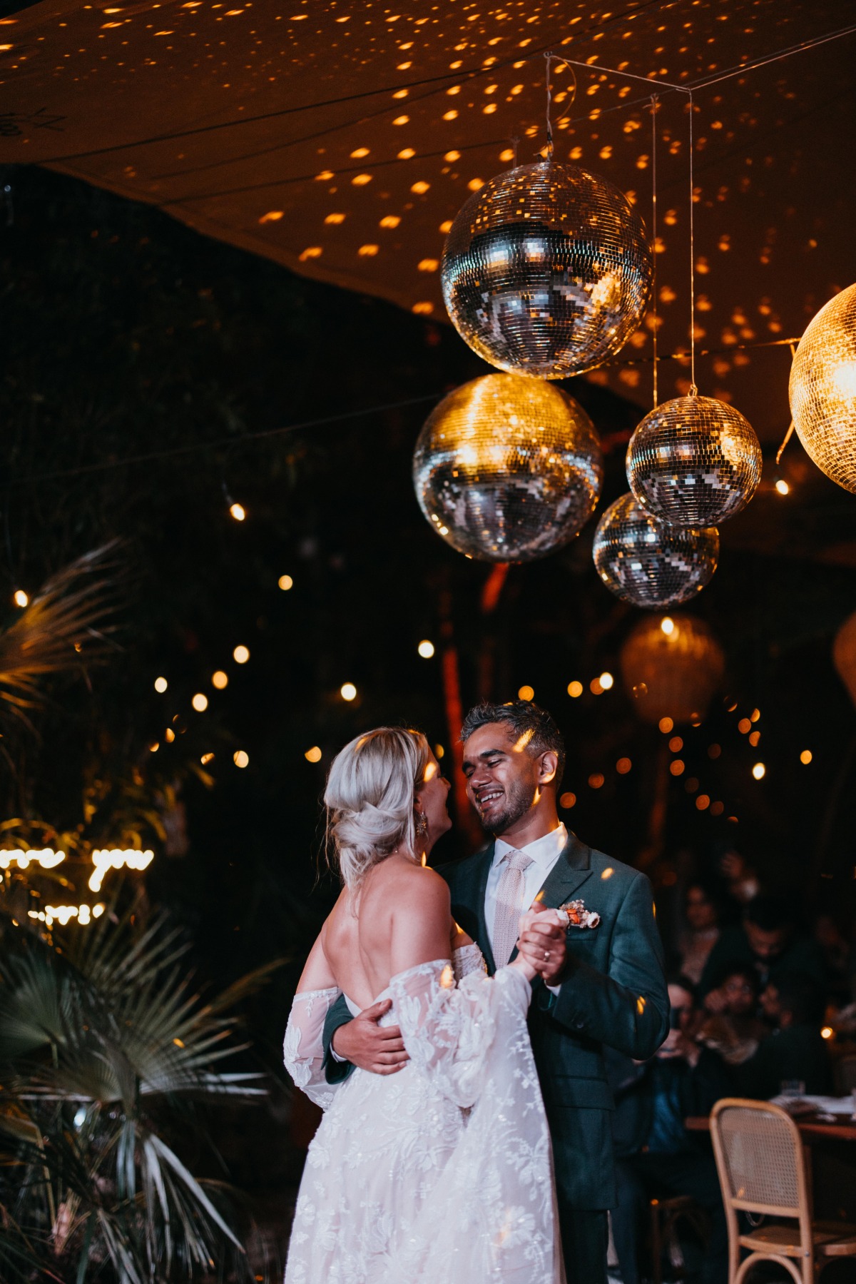 Romantic first dance under disco balls in Tulum, Mexico