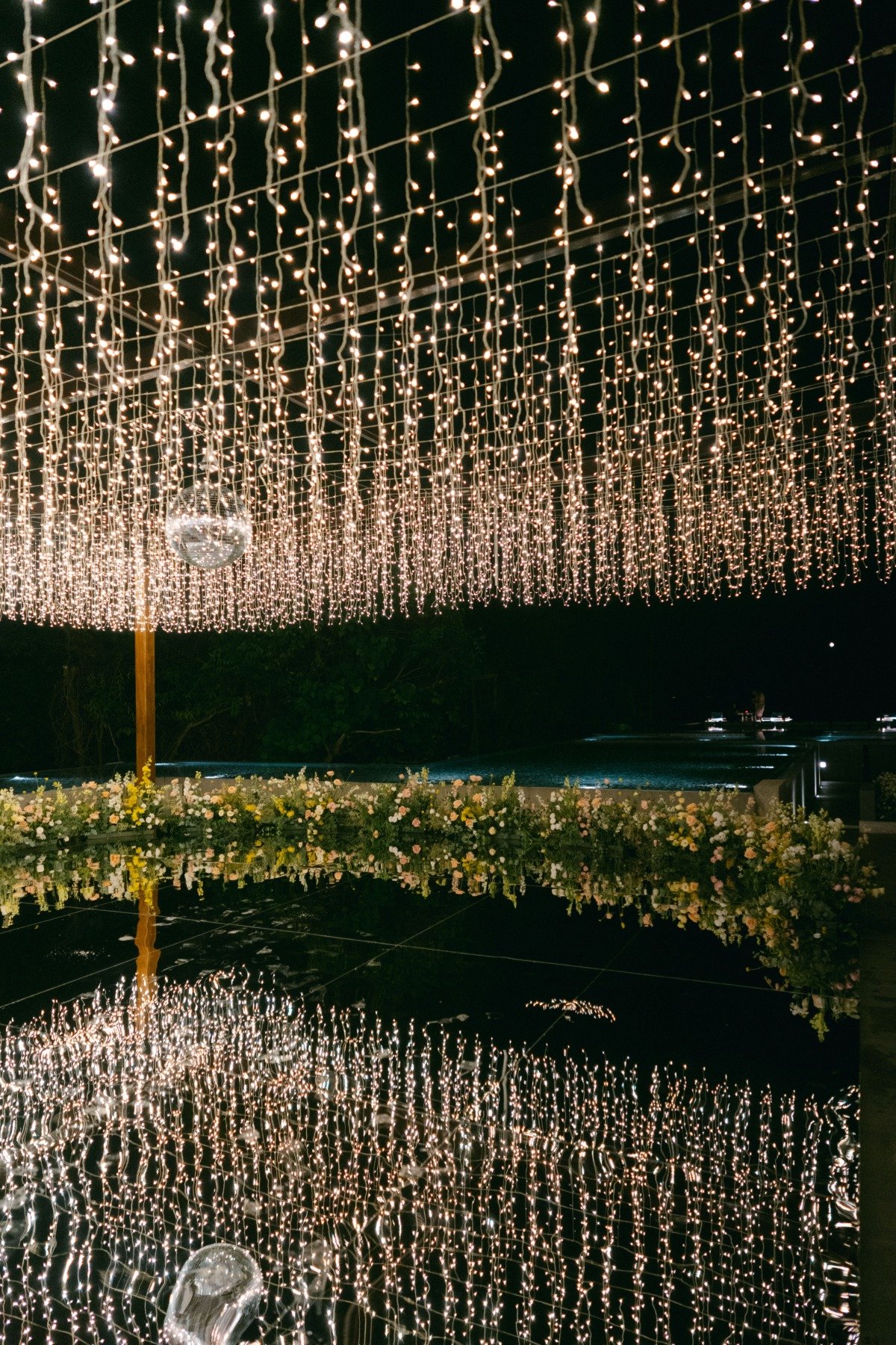 twinkle lights and mirrored dance floor for wedding