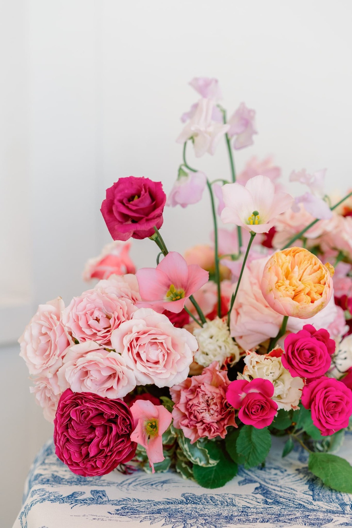 dark and light pink wedding floral arrangements