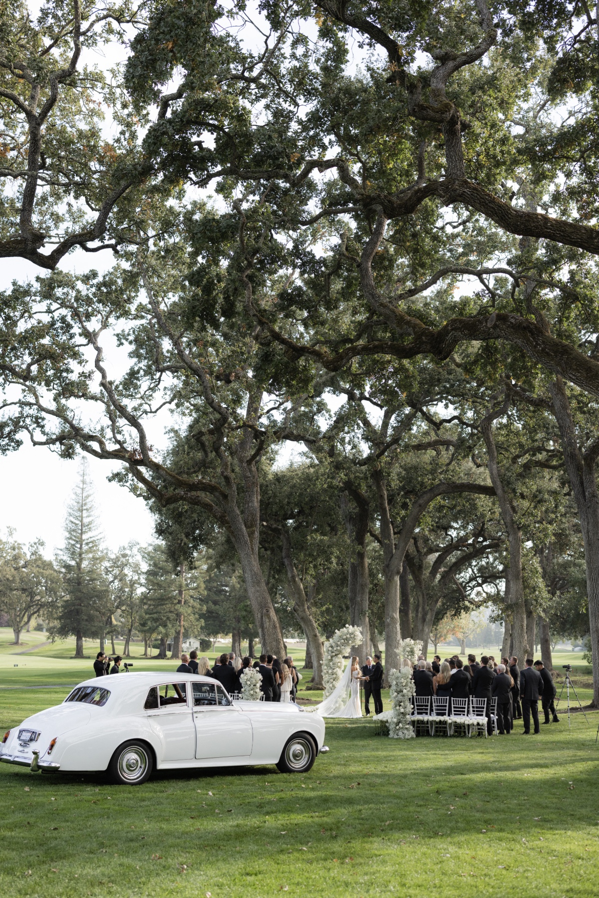 black and white wedding ceremony in napa valley with vintage car