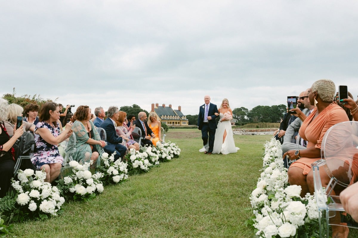 white floral arrangements wedding cremony aisle