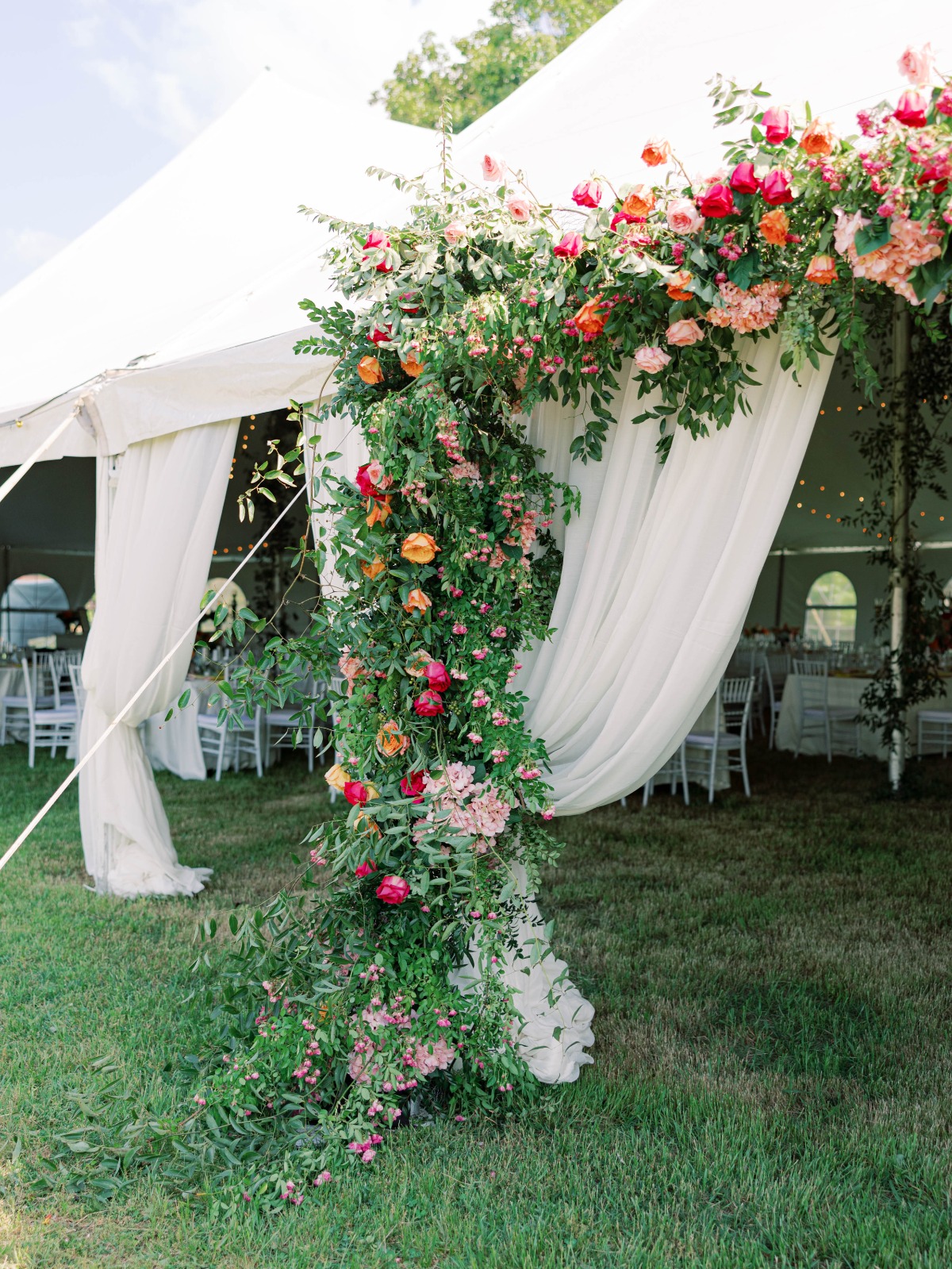 tent entrance floral installation